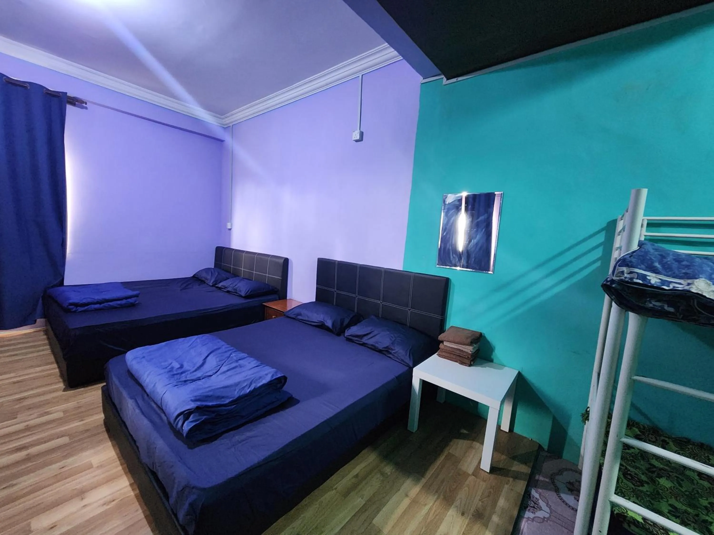 Communal lounge/ TV room, Bed in Kupi-Kupi & Stay