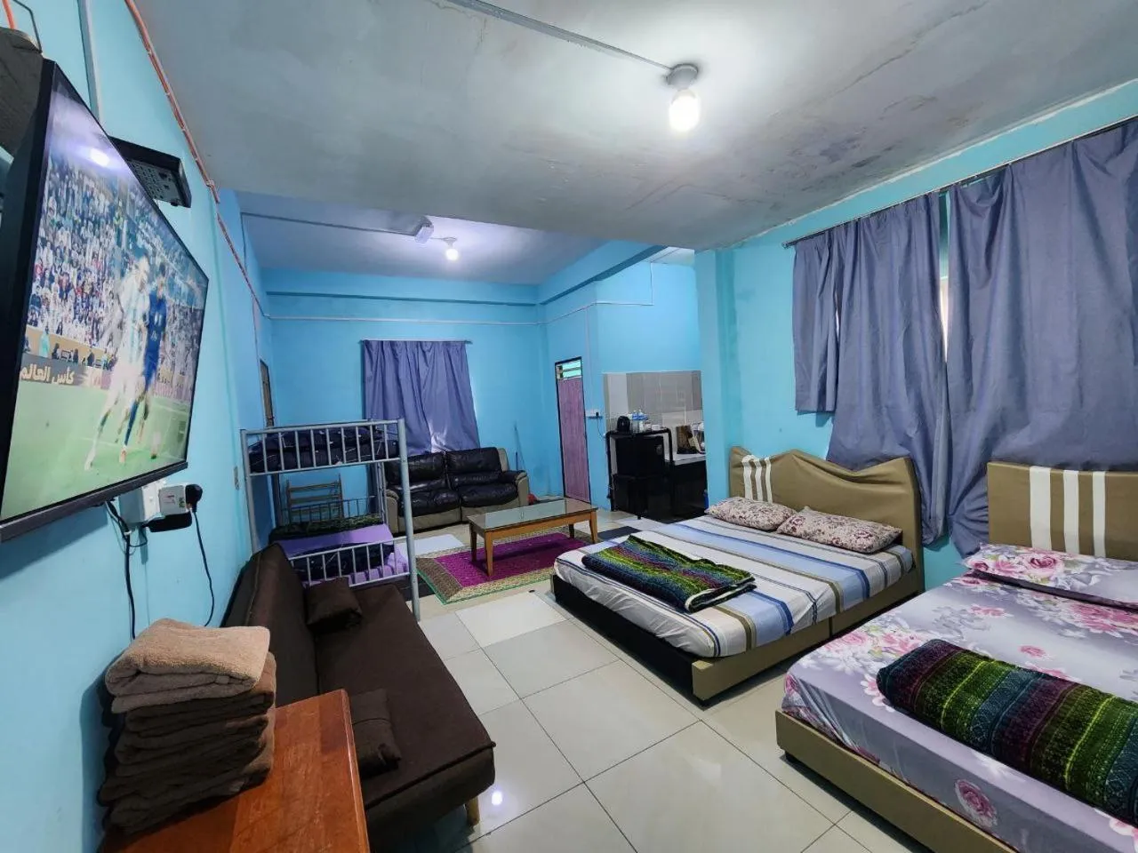 Communal lounge/ TV room, Bed in Kupi-Kupi & Stay