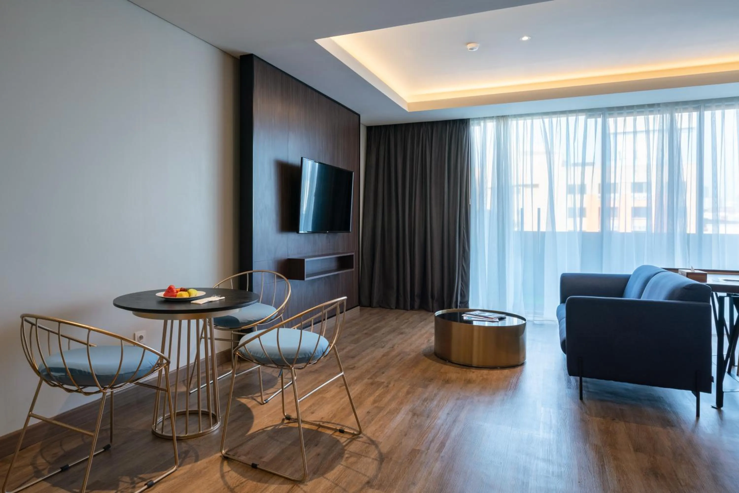 Living room in Luminor Hotel Jakarta Kota By WH