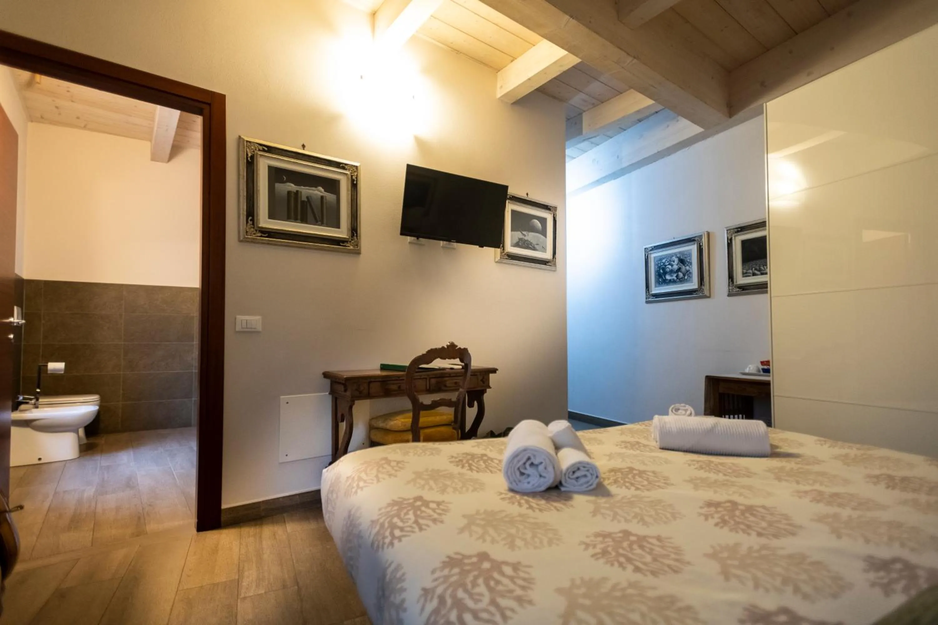 Bed in Al Battistero Luxury Suite