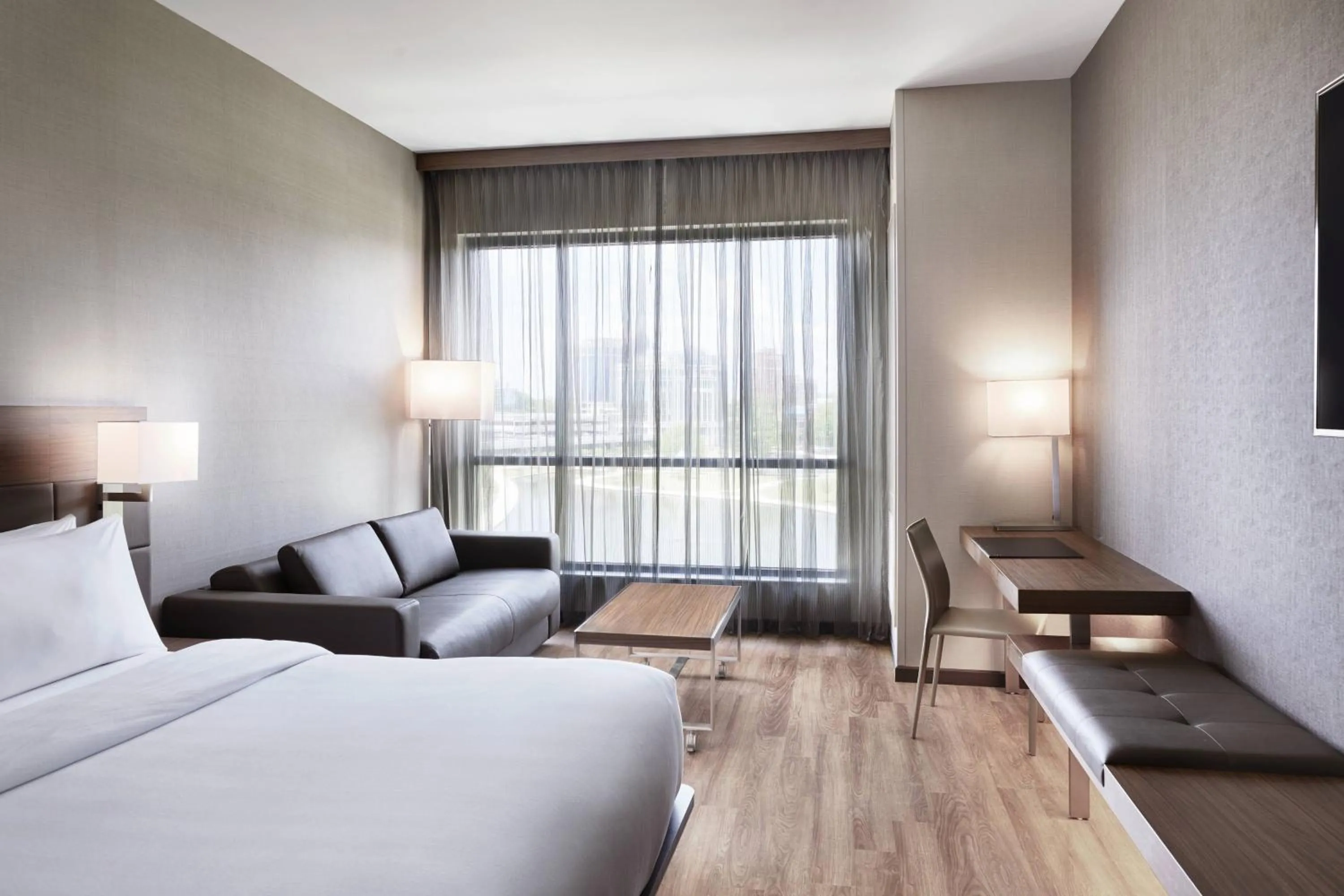 Photo of the whole room, Bed in AC Hotel by Marriott Huntsville Downtown