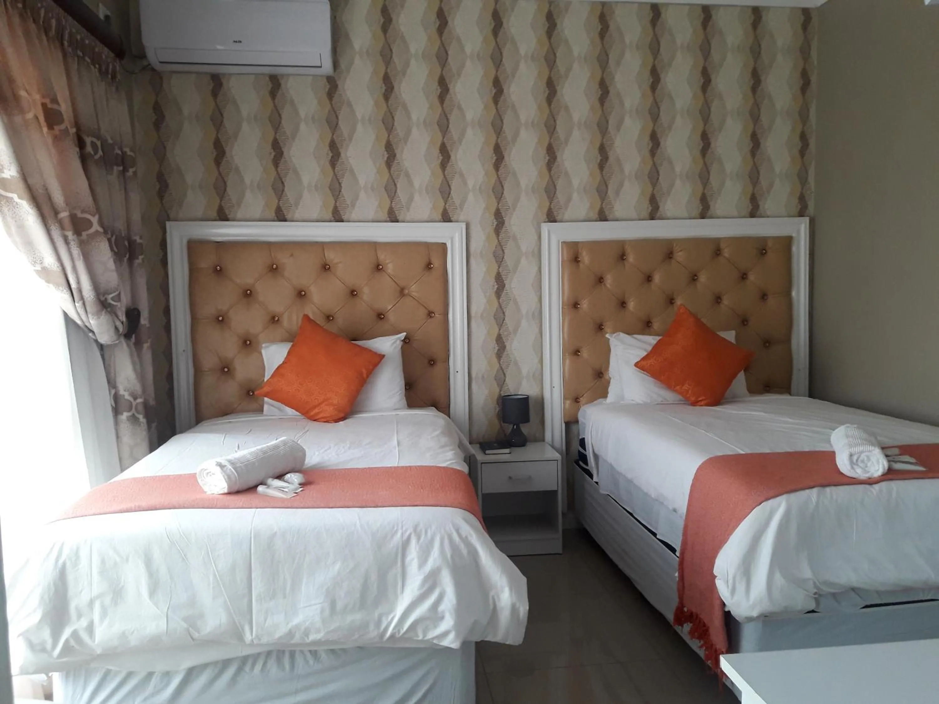 Bed in Vakhusi Guesthouse