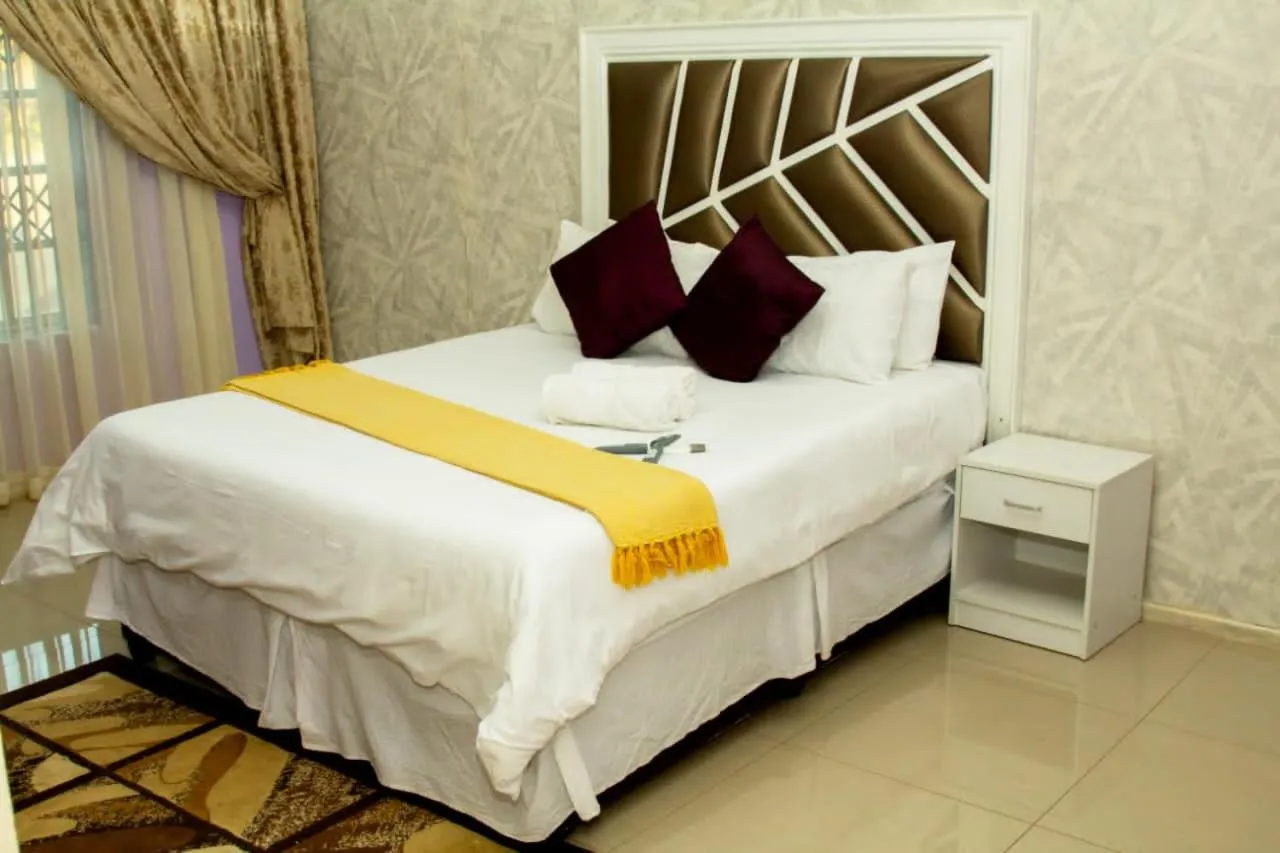 Bed in Vakhusi Guesthouse