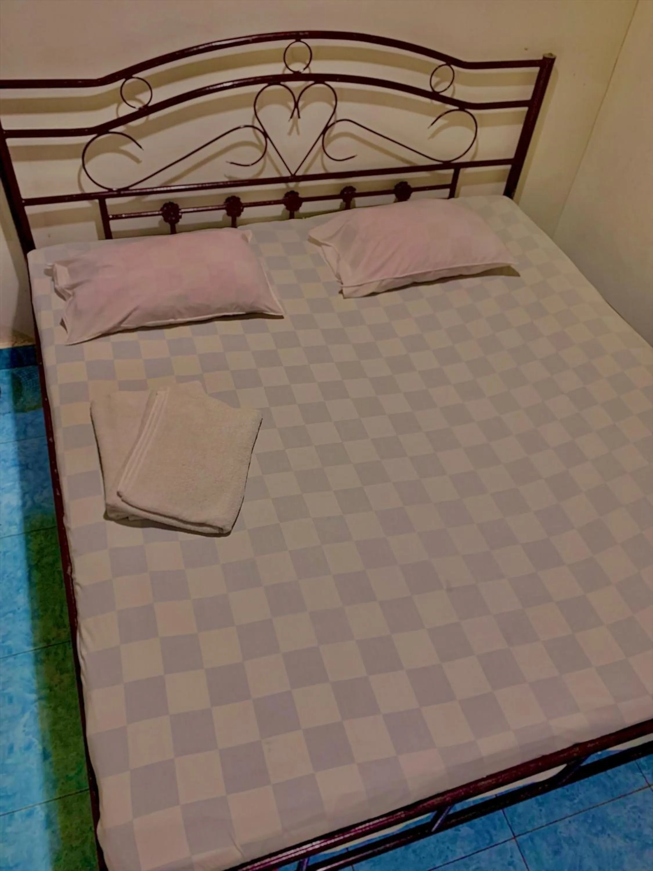 Bed in Hotel Rembulan