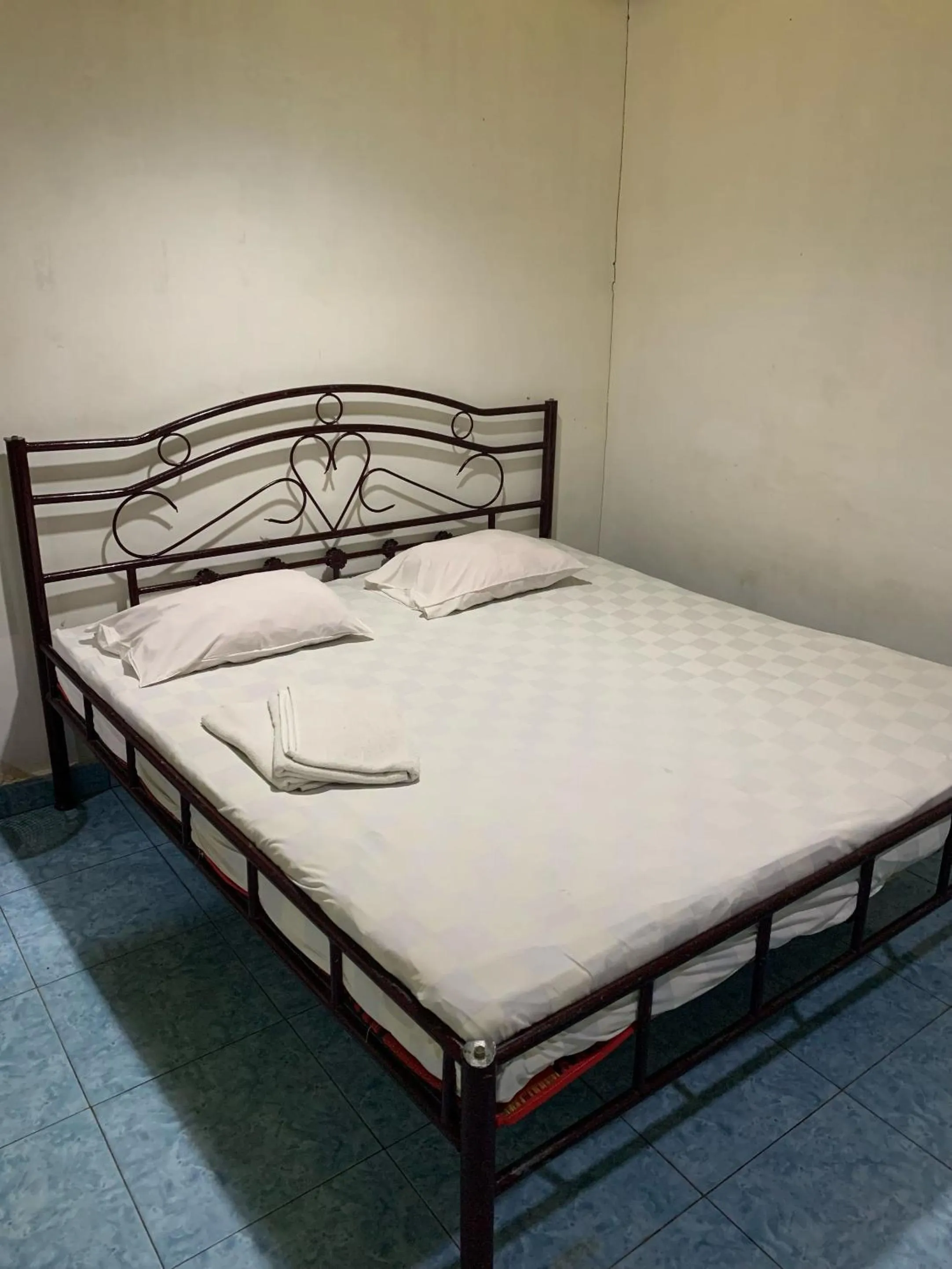 Bed in Hotel Rembulan