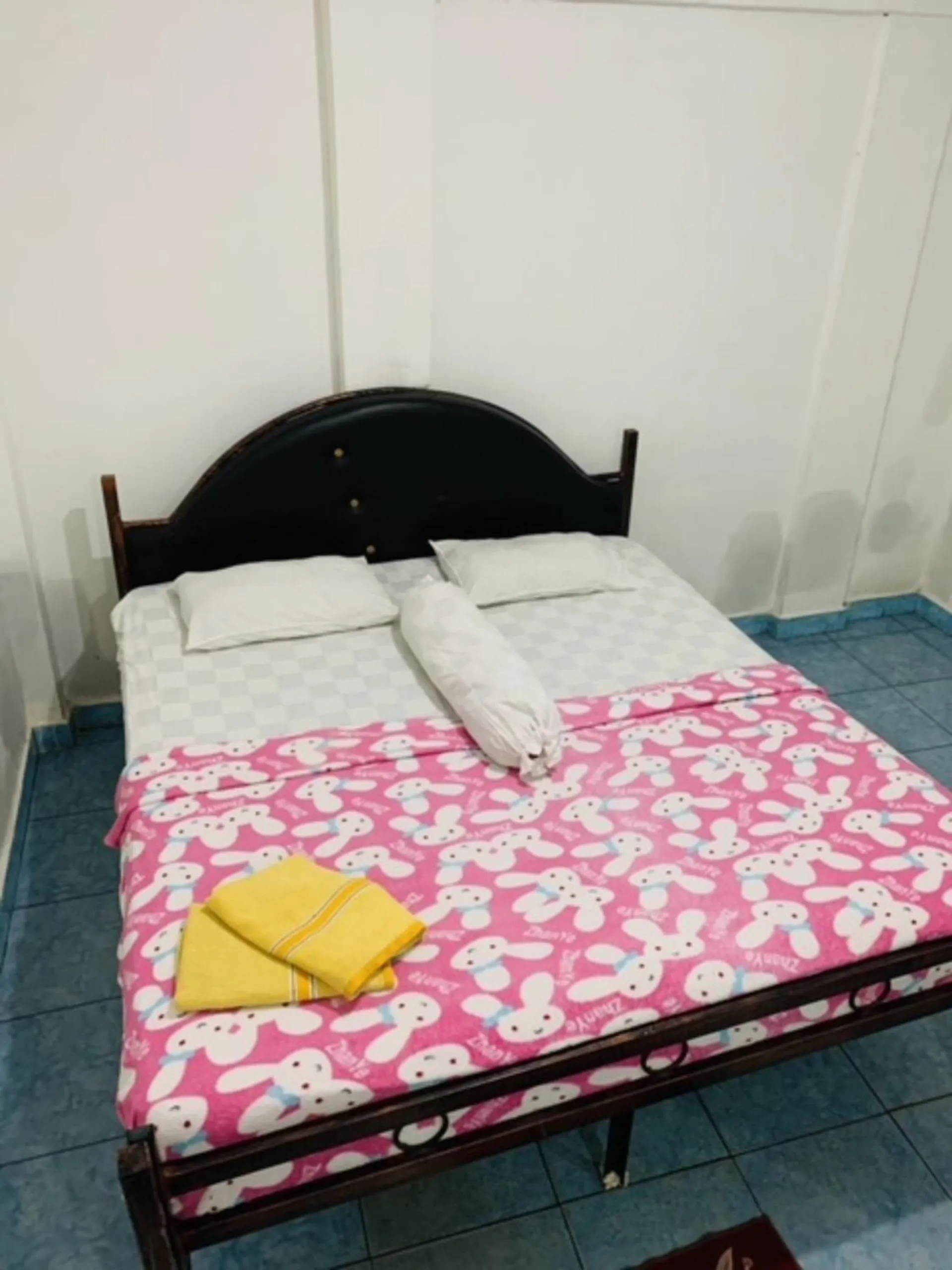 Bed in Hotel Rembulan