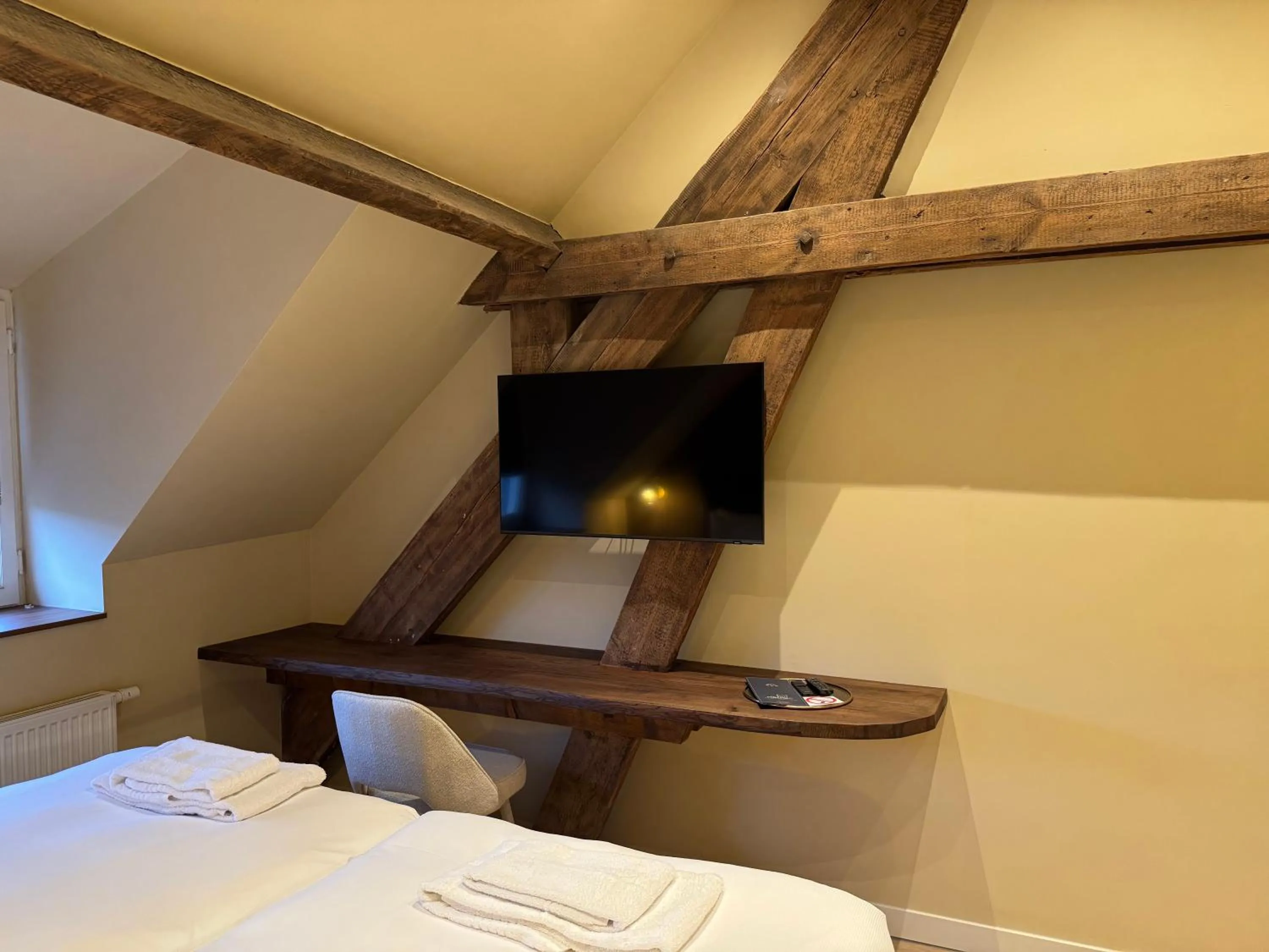 Bed in De Pastorie Bed & Breakfast