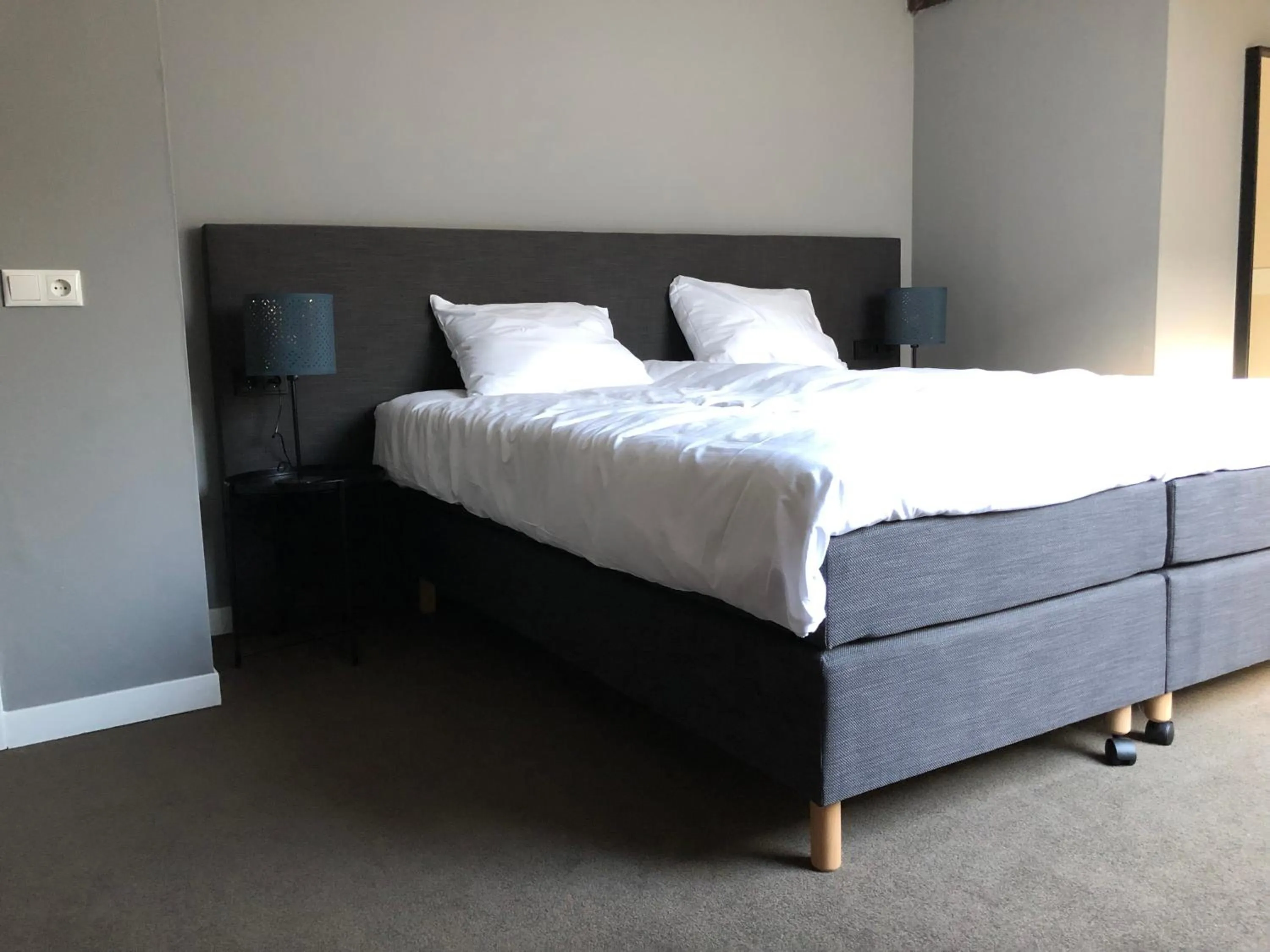 Bed in De Pastorie Bed & Breakfast