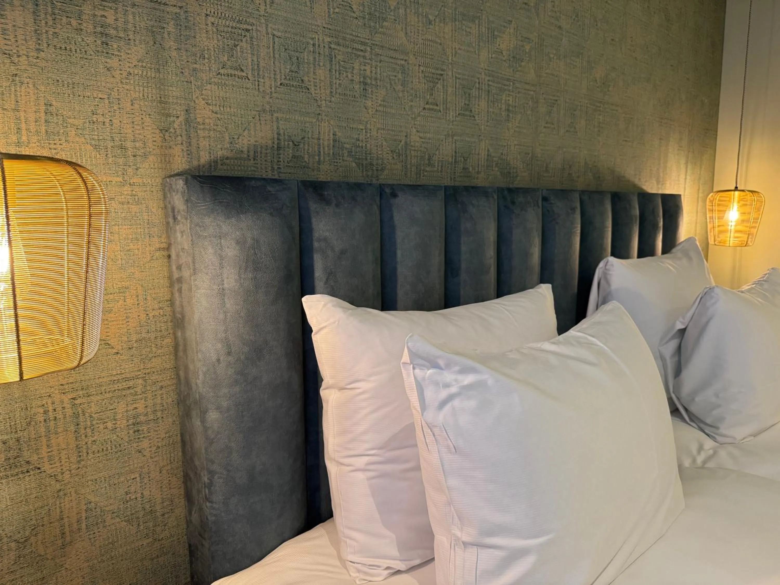 Bed in De Pastorie Bed & Breakfast