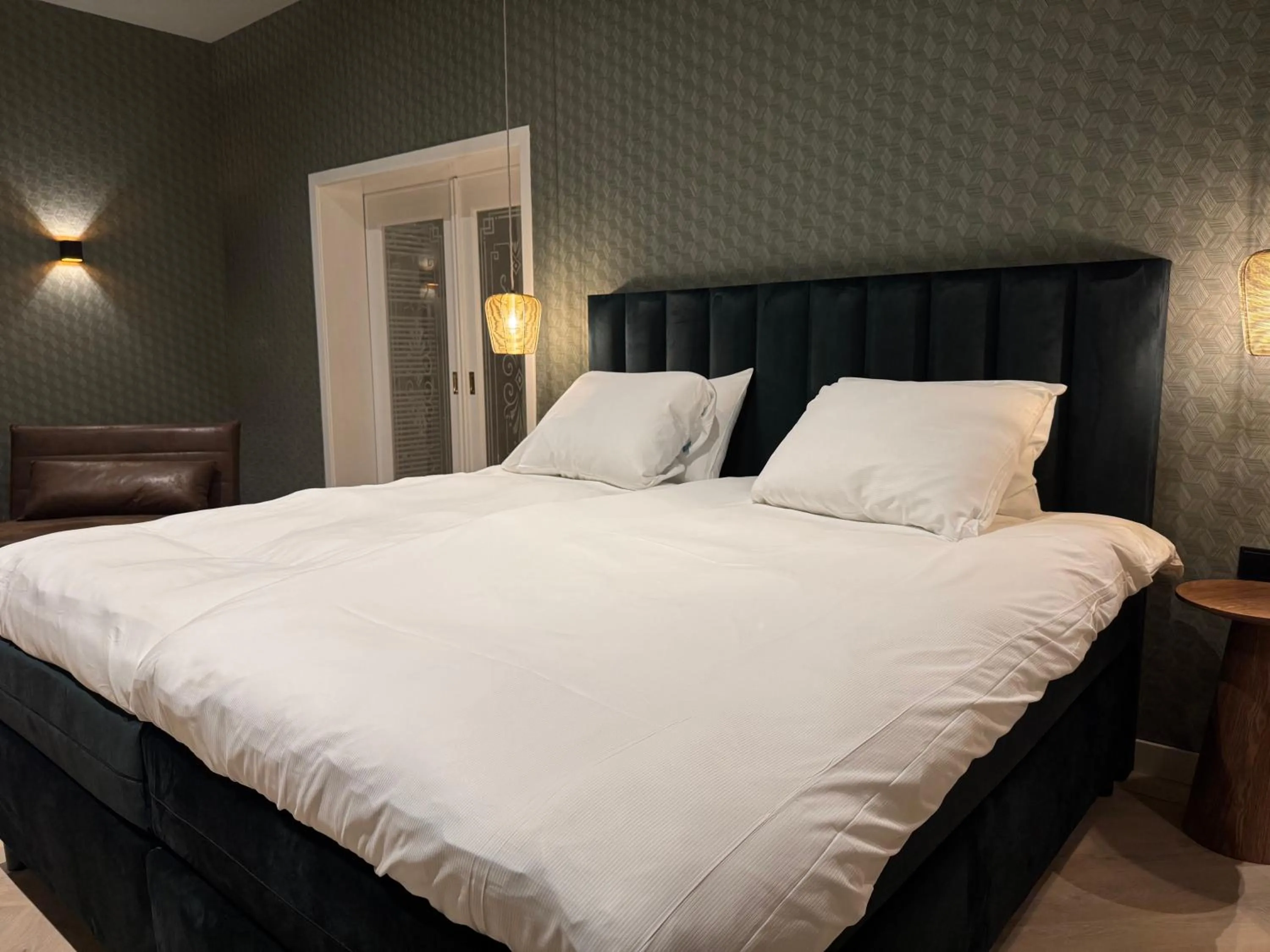 Bed in De Pastorie Bed & Breakfast