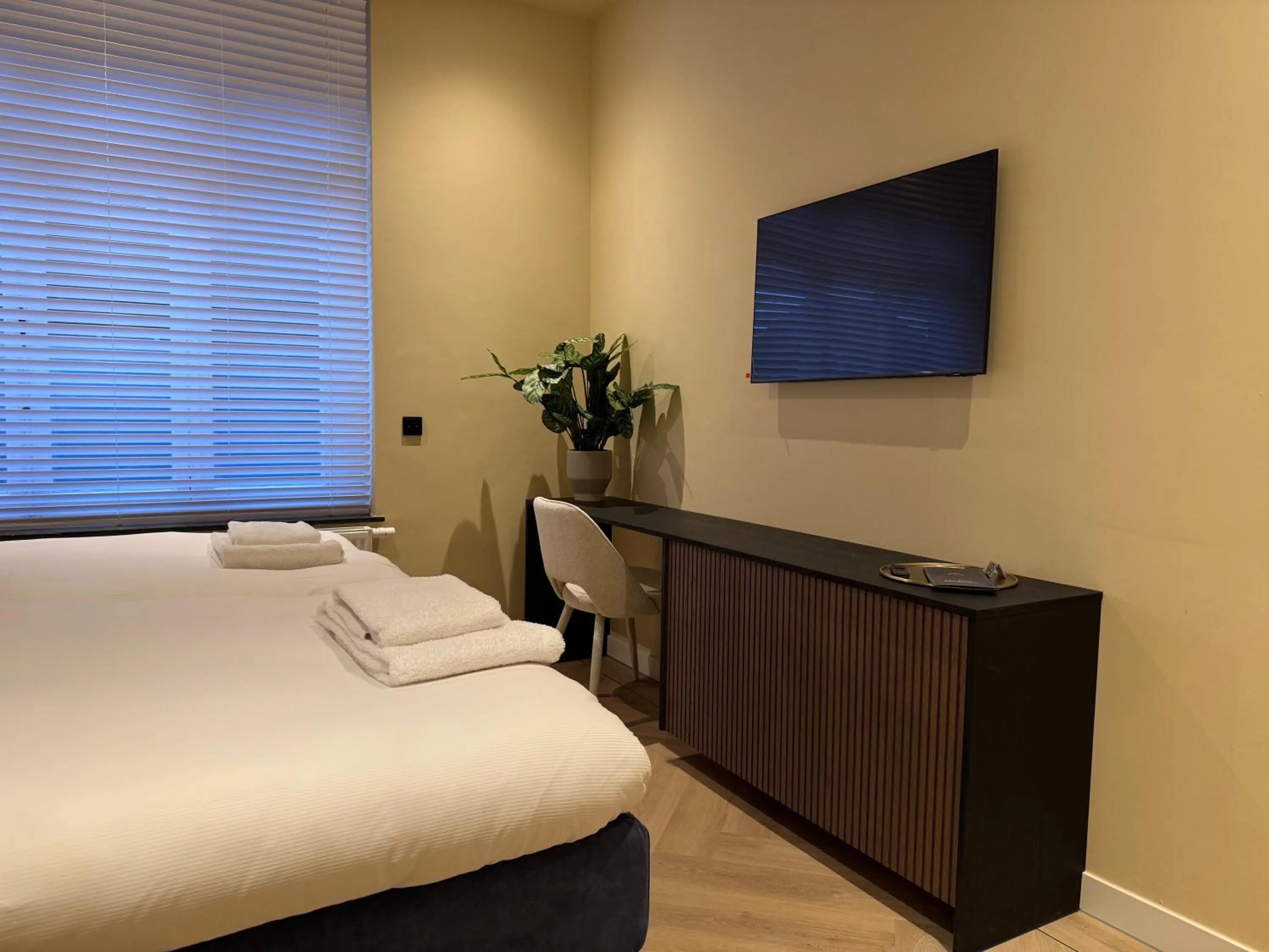 Bed in De Pastorie Bed & Breakfast