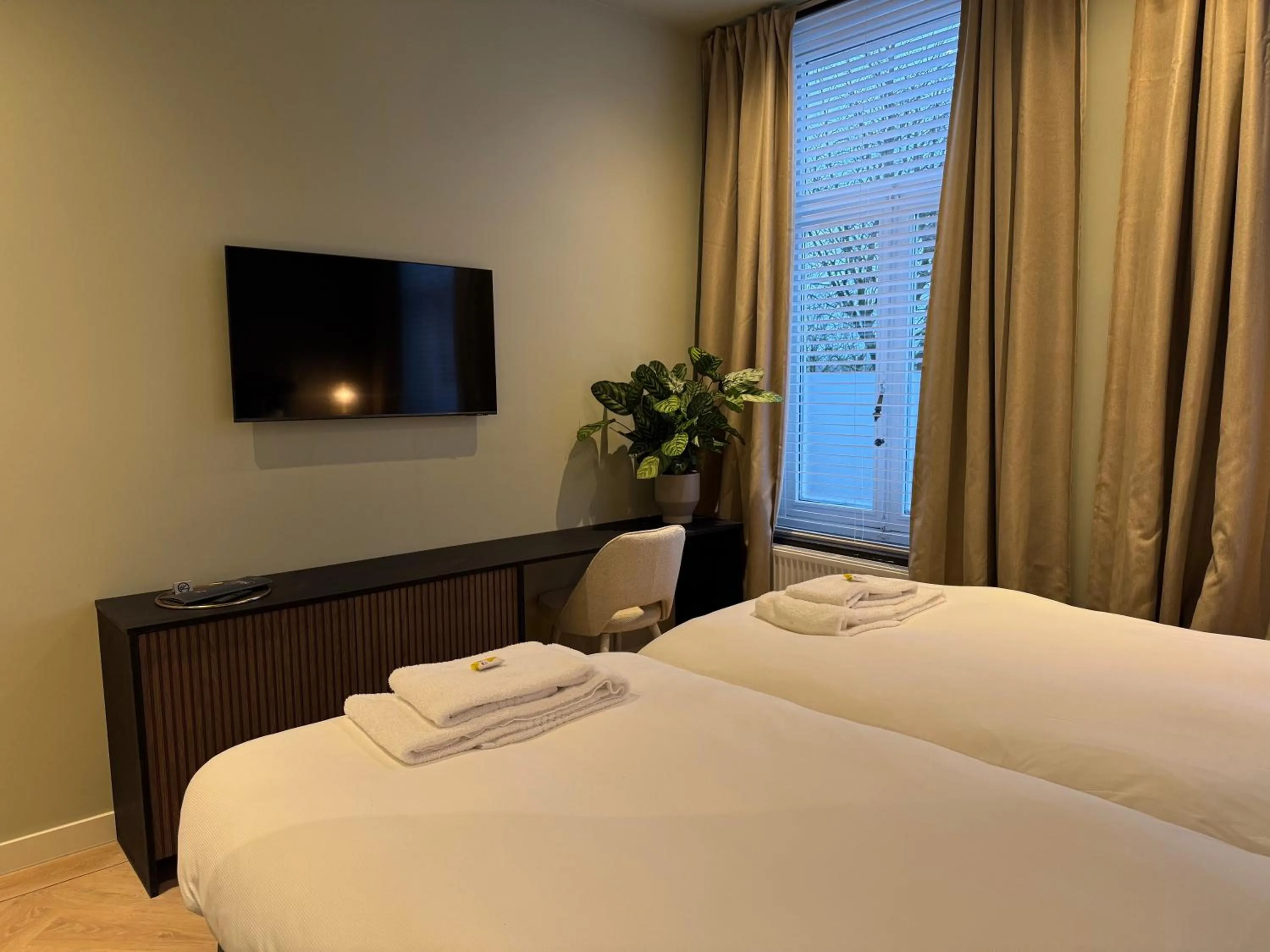 Bed in De Pastorie Bed & Breakfast