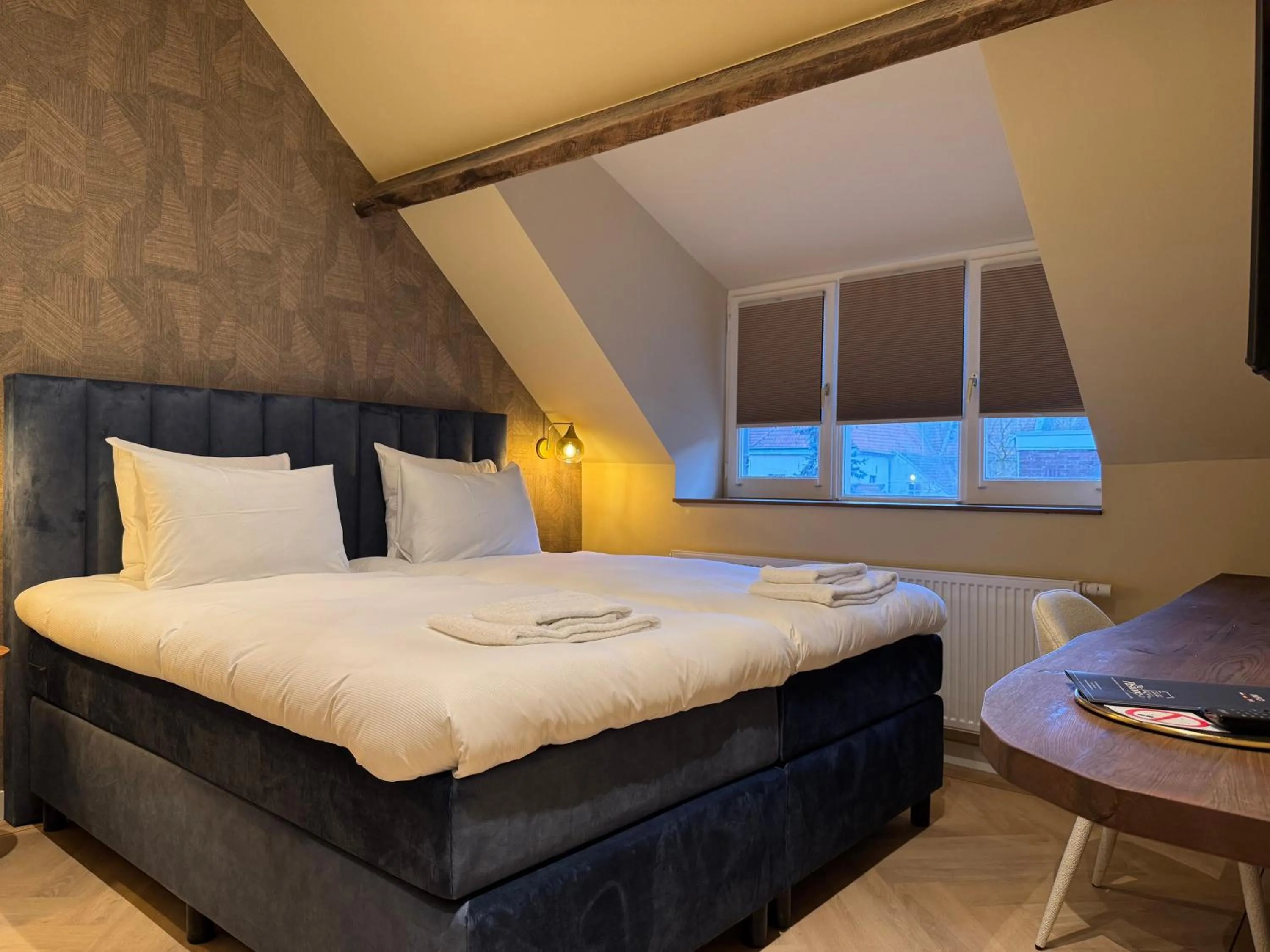 Bed in De Pastorie Bed & Breakfast