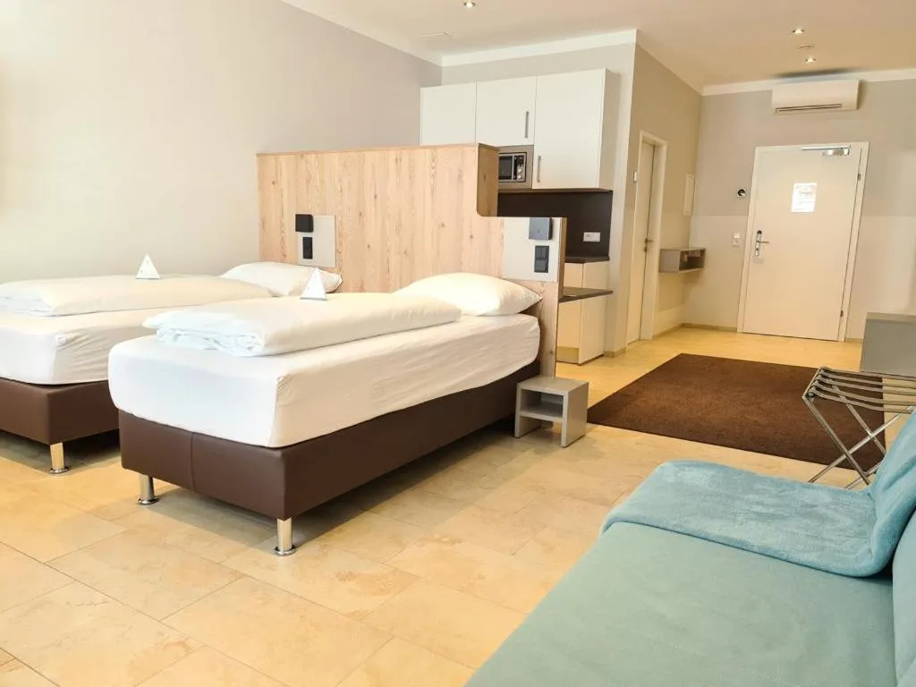 Photo of the whole room, Bed in TT Aparthotel Neuhofen