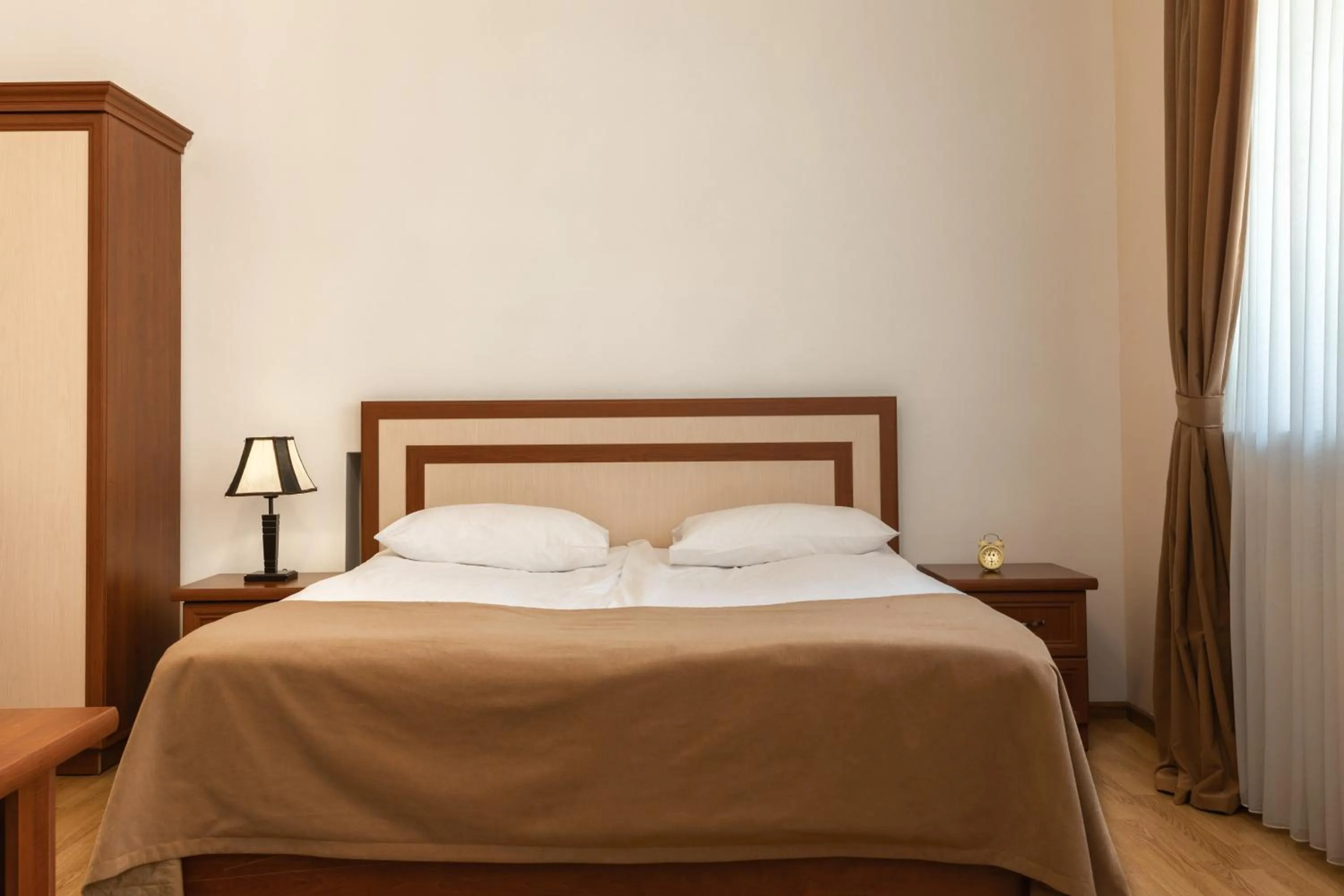 Bed in Ariana Family Hotel