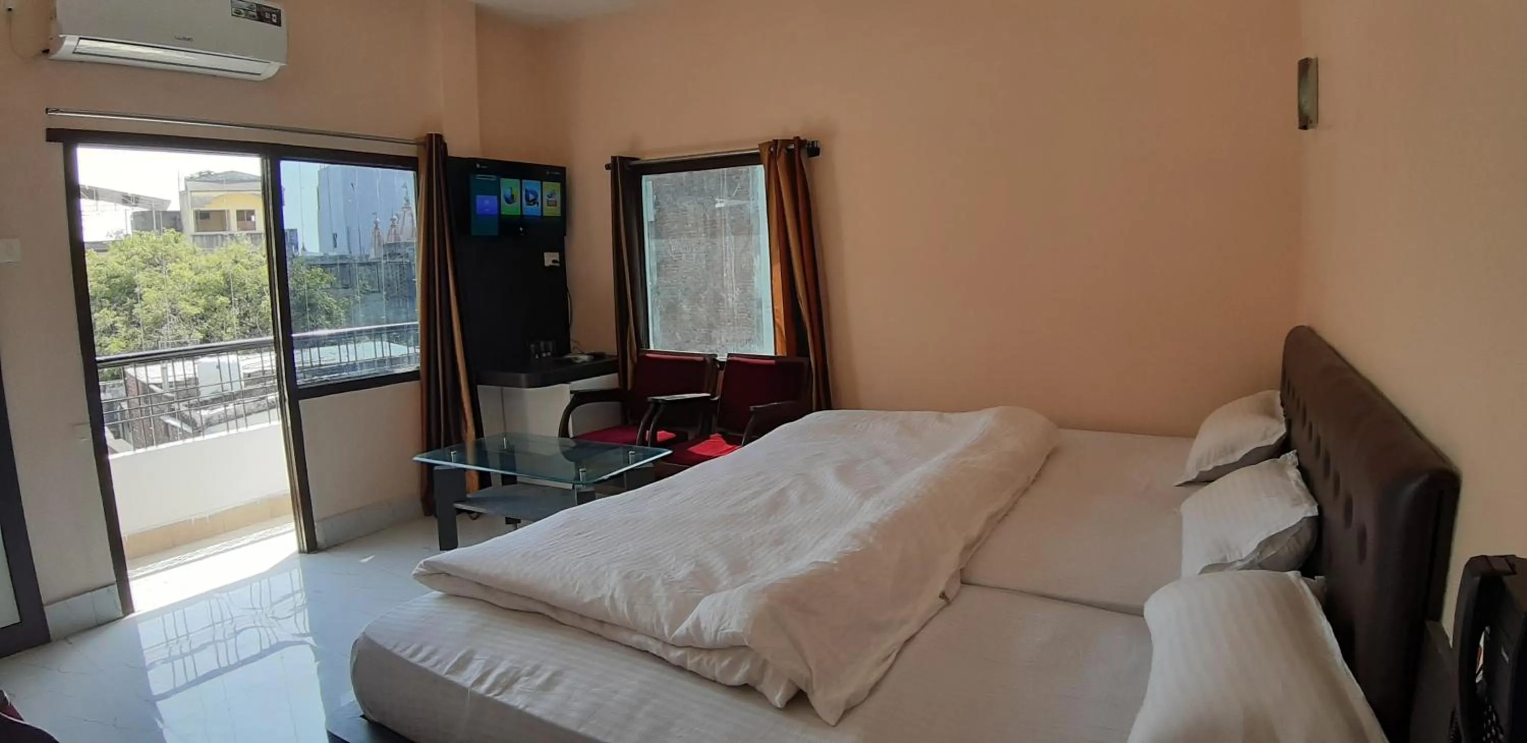 Photo of the whole room, Bed in Sita Inn Home Stay Away From Home By Hotel Sita Varanasi