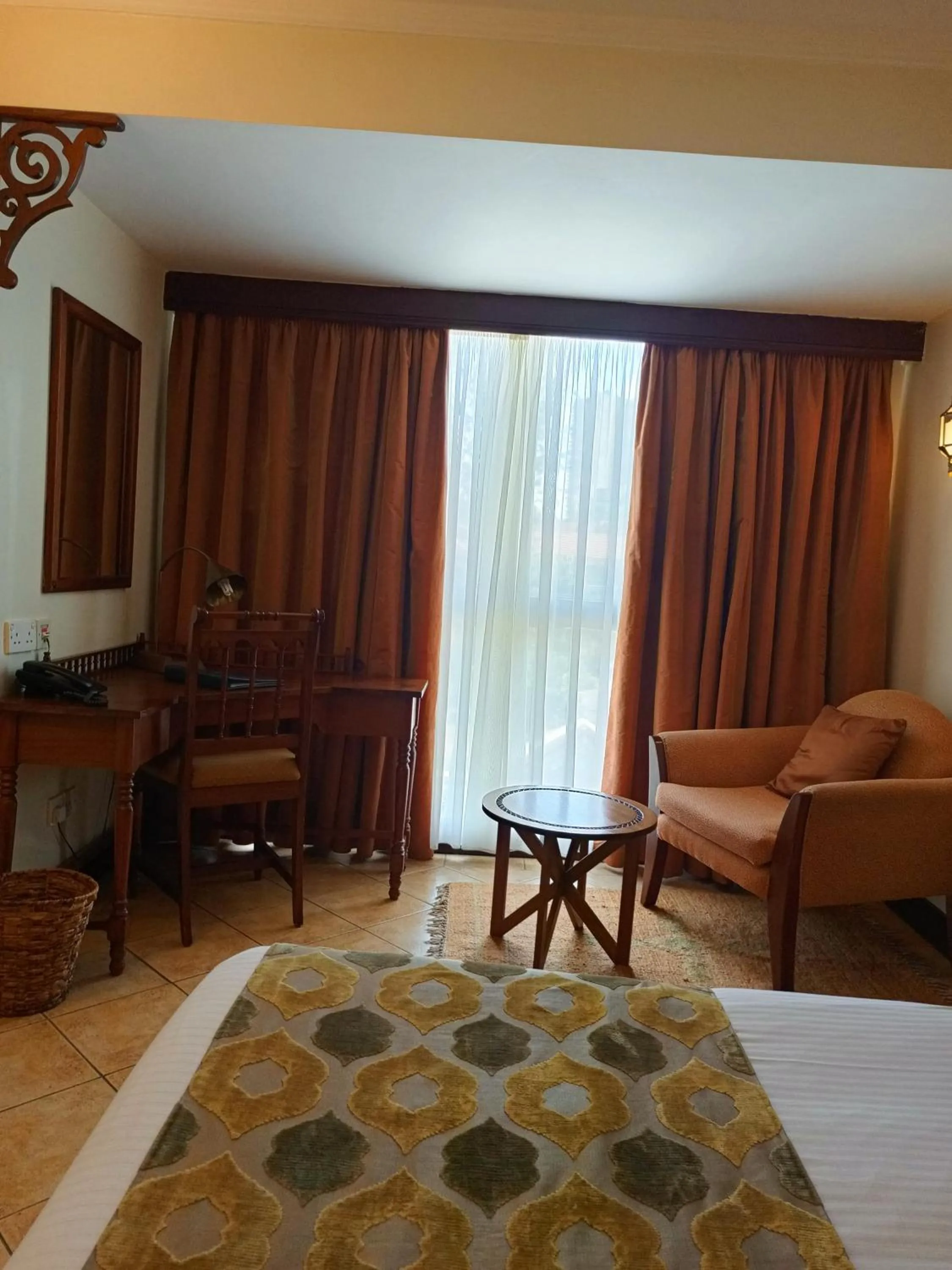 Seating area, Bed in The Heron By Sarovar Portico India