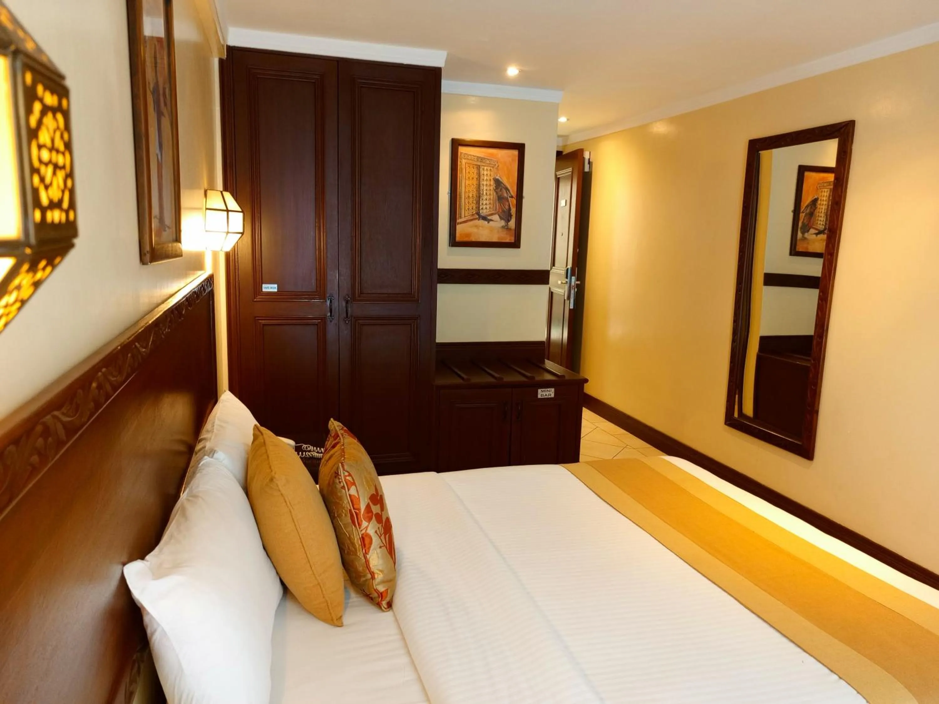 Bed in The Heron By Sarovar Portico India