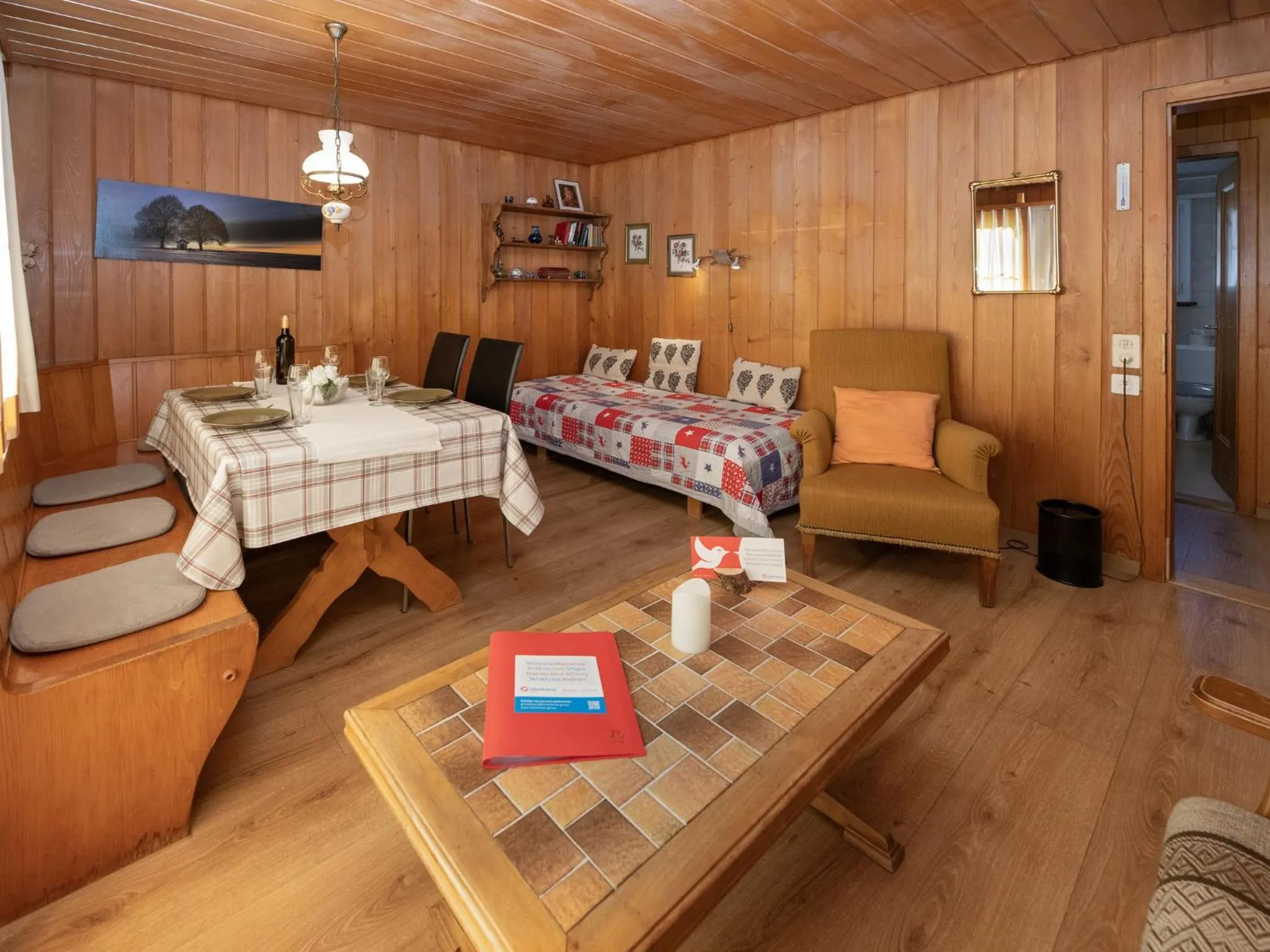 Living room in Apartment Chalet Spassvogel by Interhome