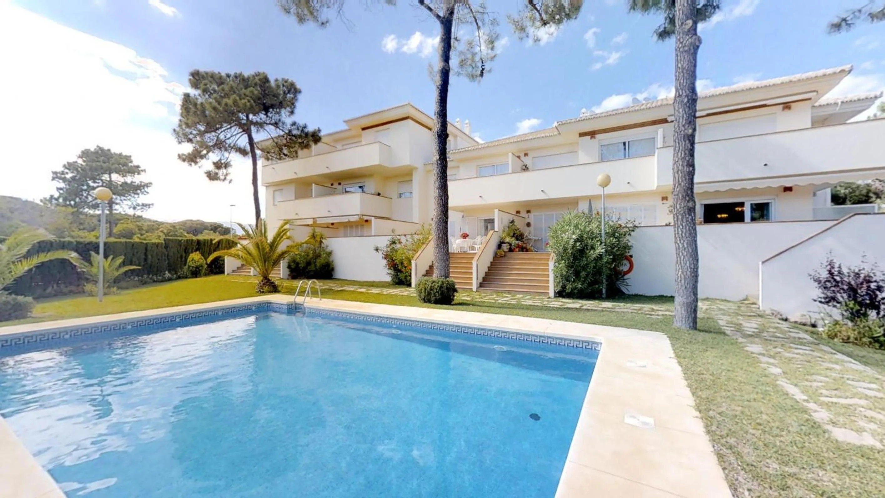 Property building in Very nice family apartment, direct pool access