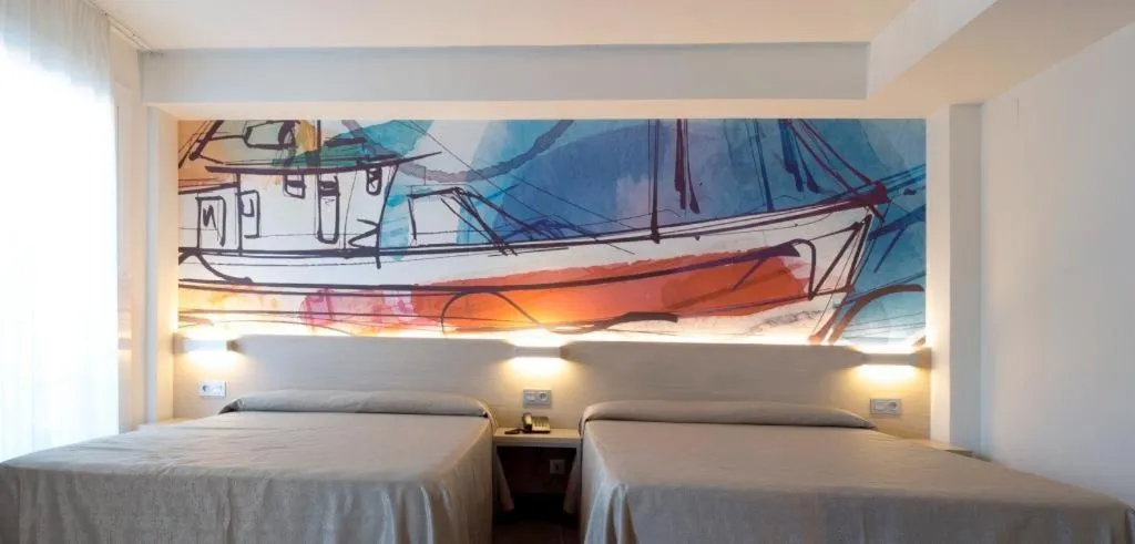 Bed in Hotel Riviera