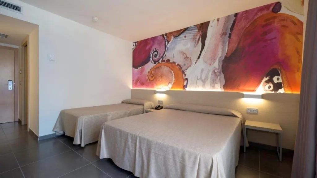 Bed in Hotel Riviera