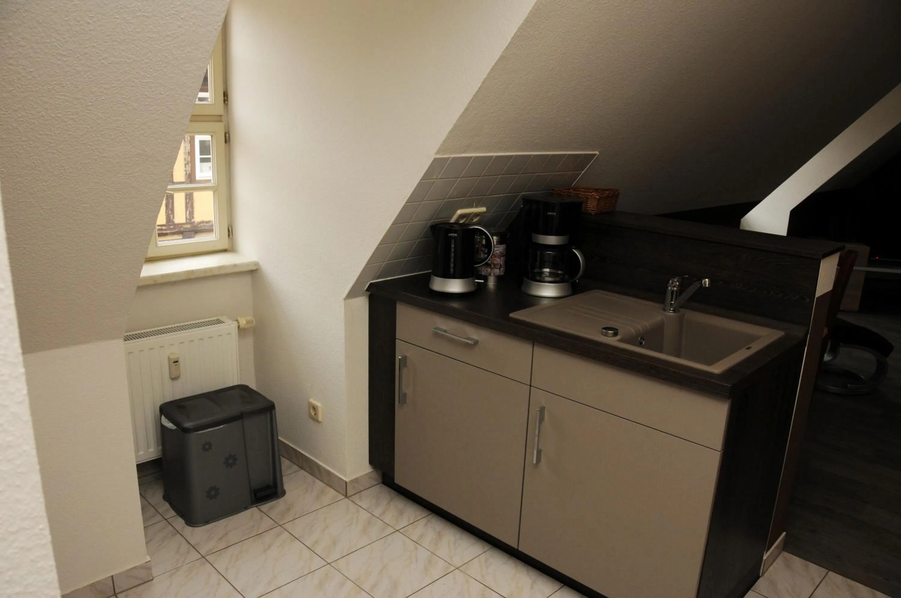 Kitchen or kitchenette in Apartments am Brunnen