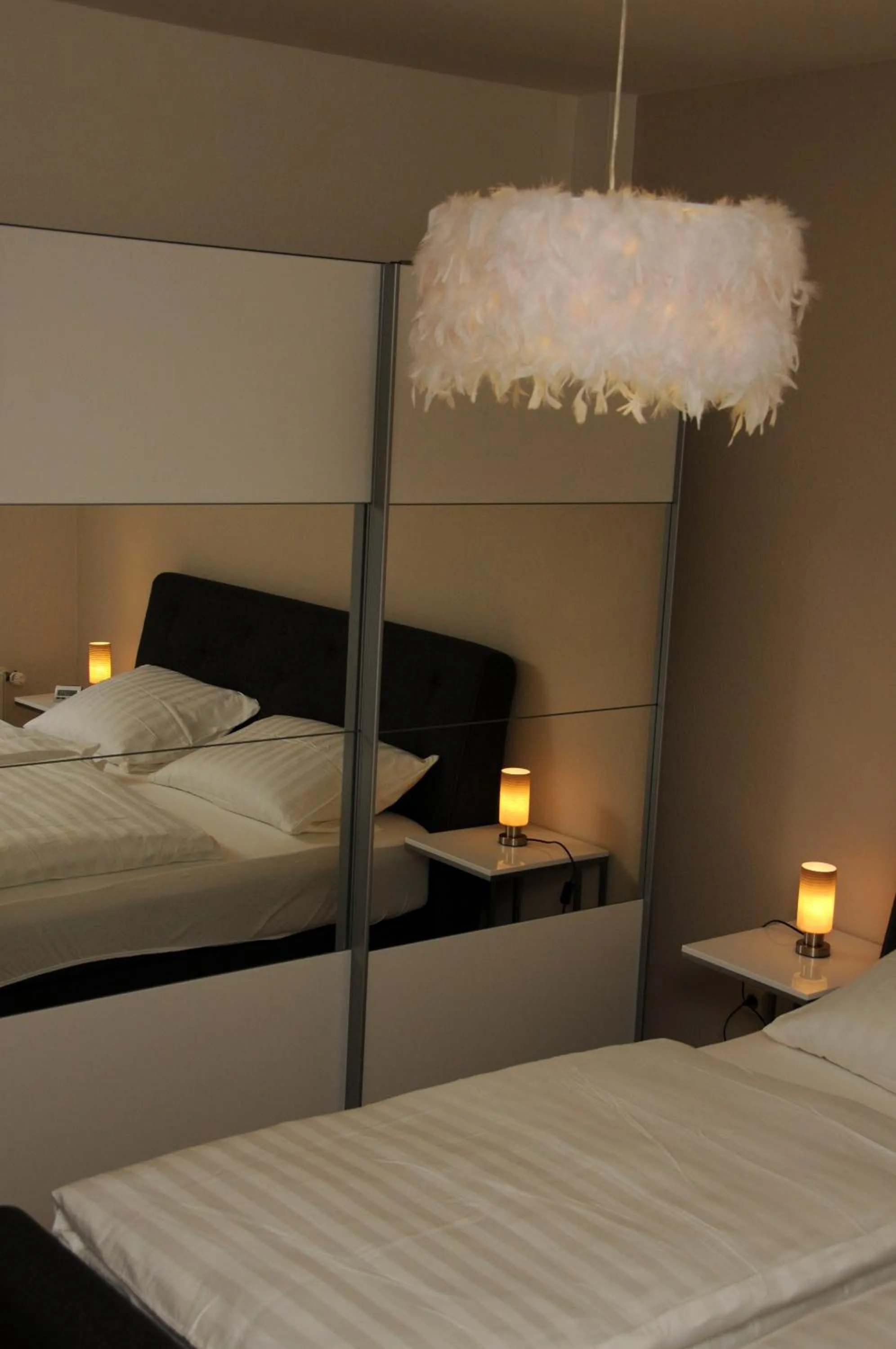 Bed in Apartments am Brunnen