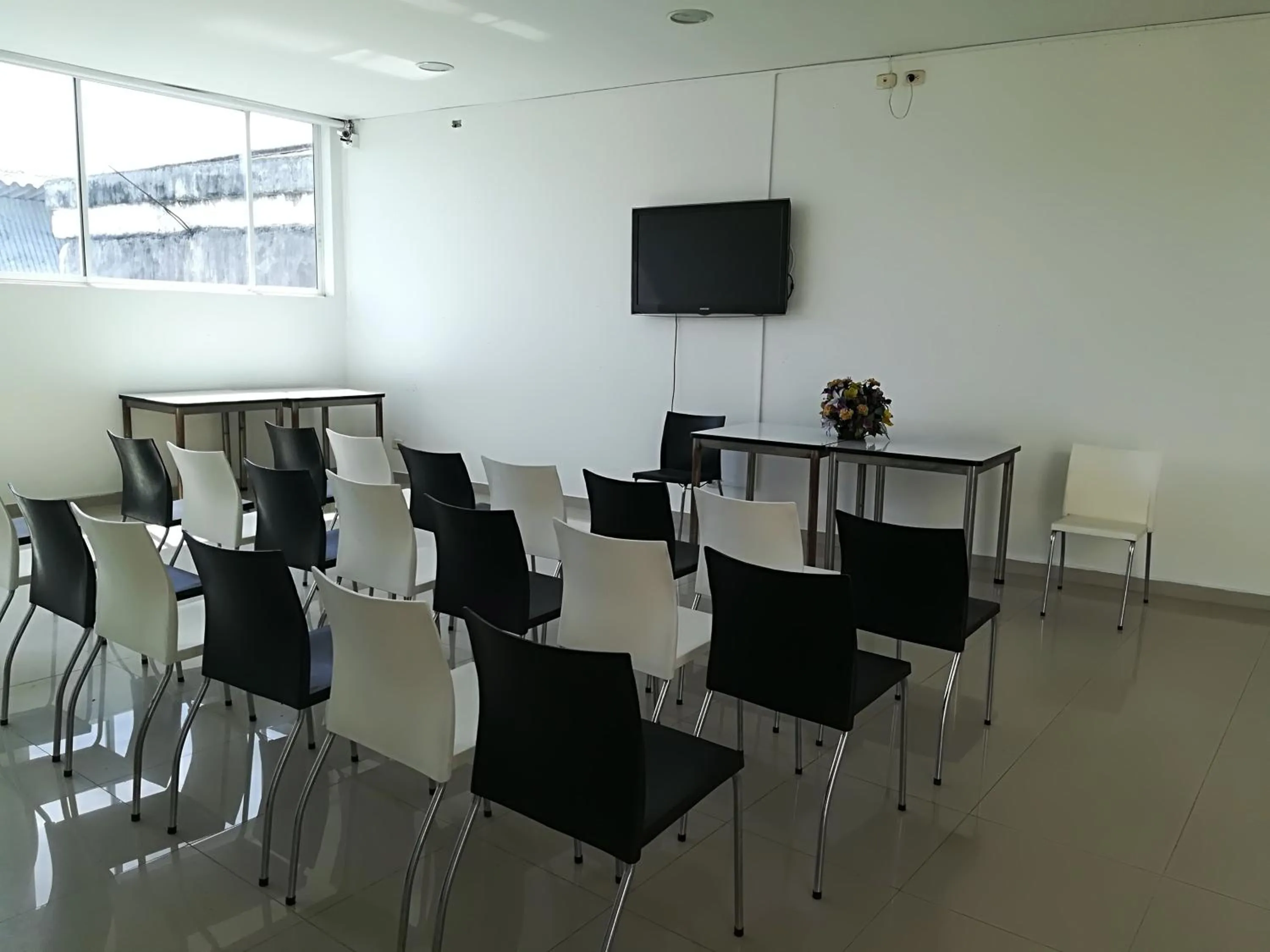 Communal lounge/ TV room in Magdalena Imperial Hotel By GHO Hoteles