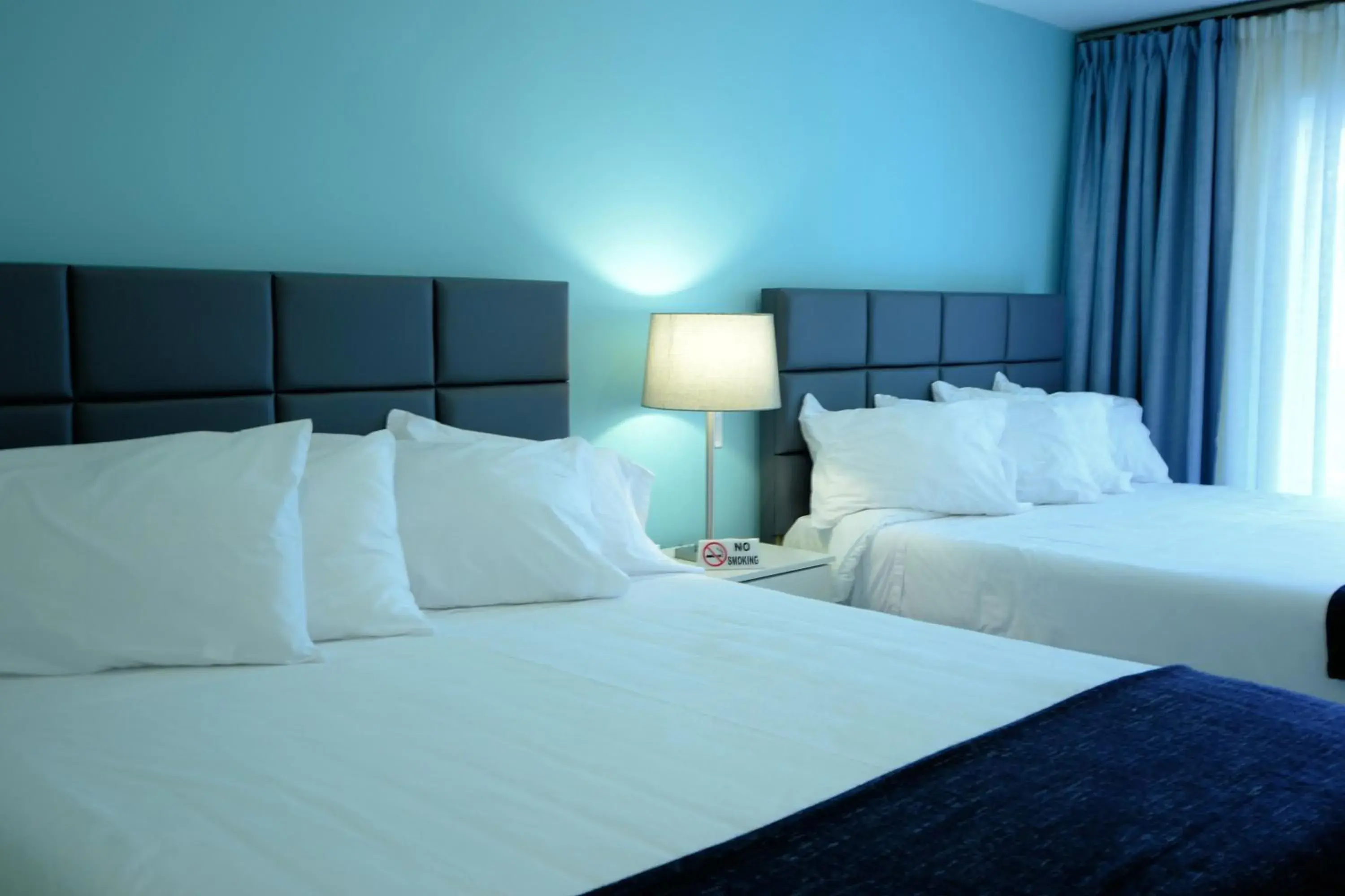 Queen Room with Balcony in Quints Travelers Inn Queen Room with Balcony in Quints Travelers Inn