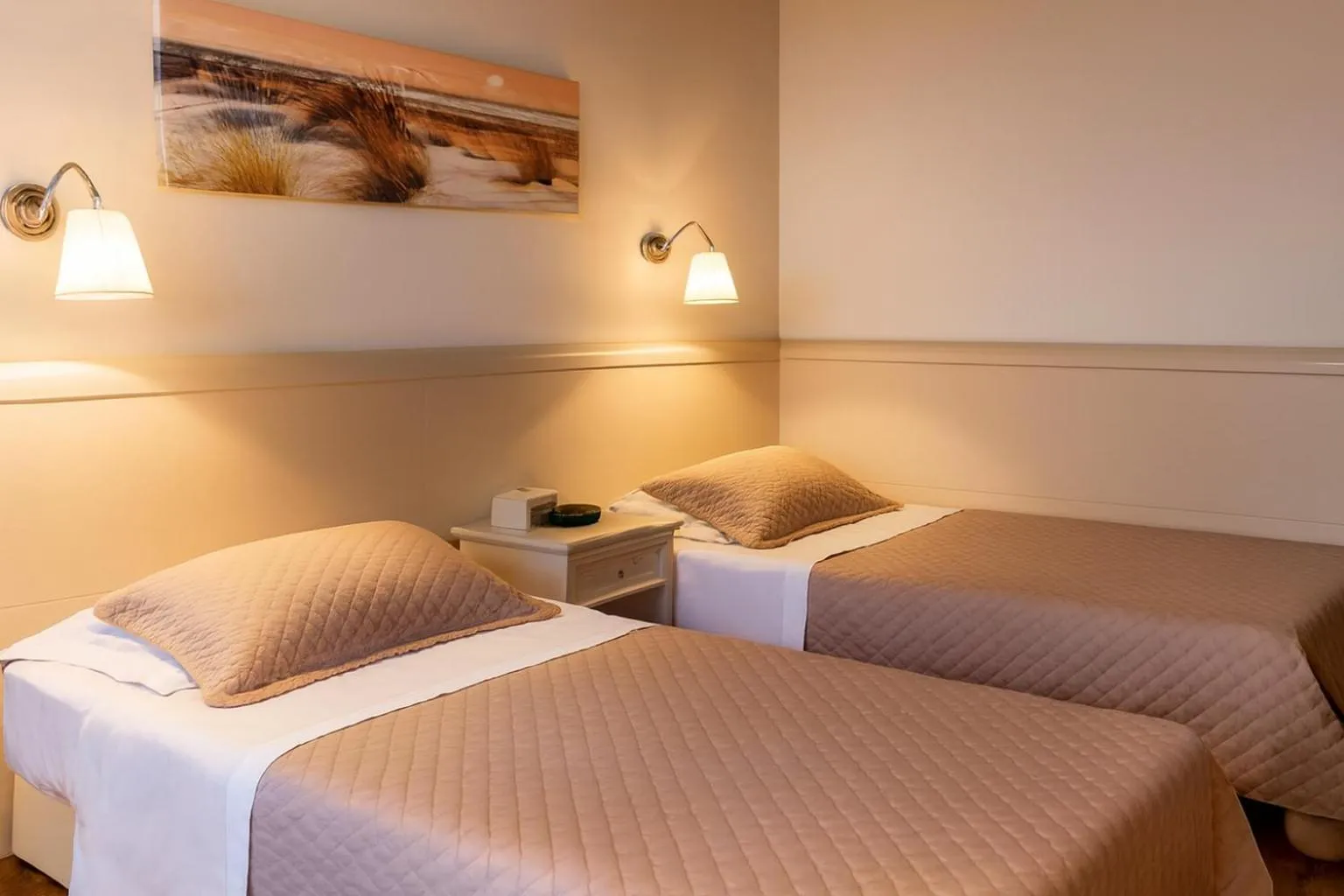 Bed in Hotel Ariston