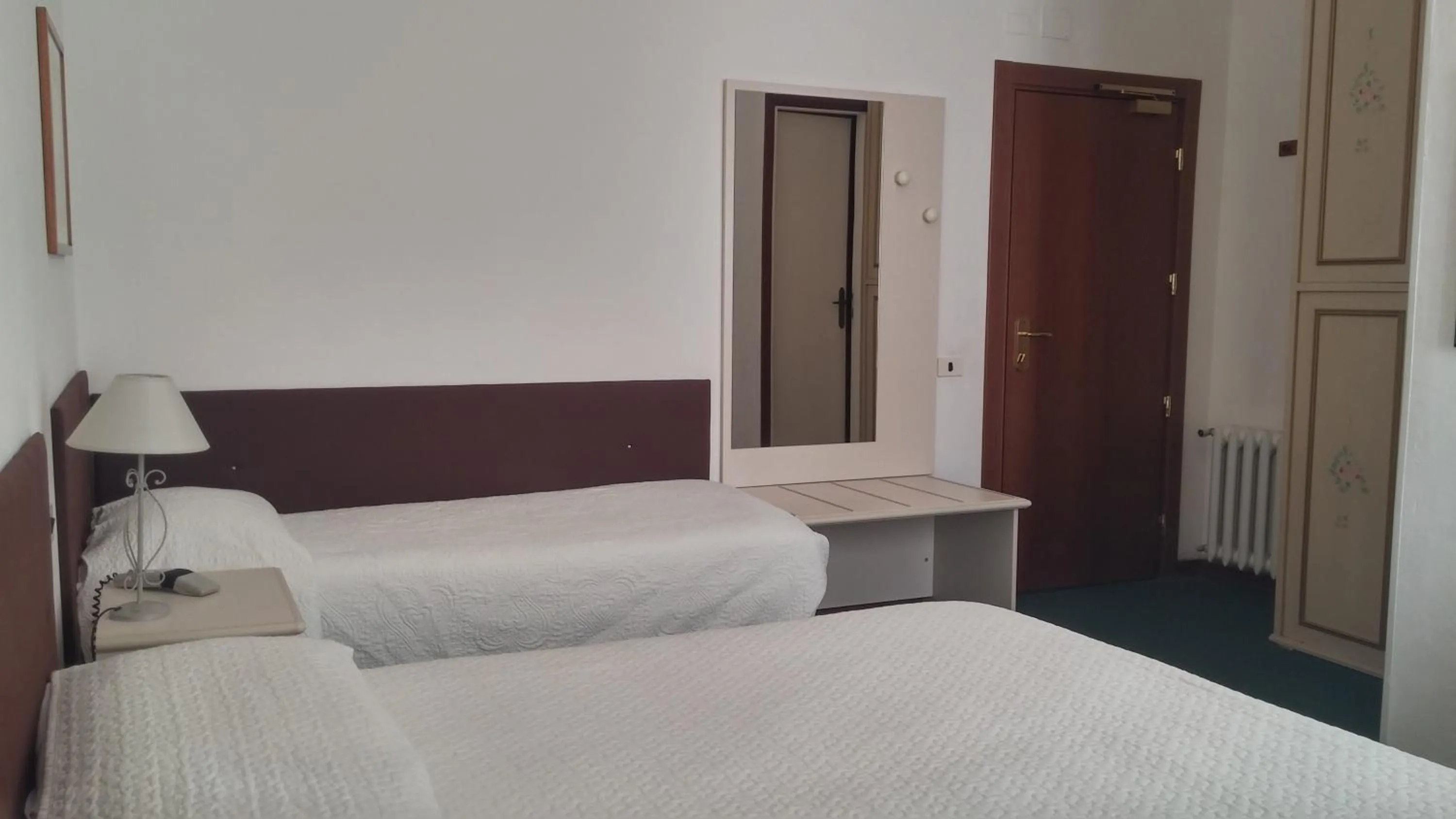 Bed in Hotel Ariston