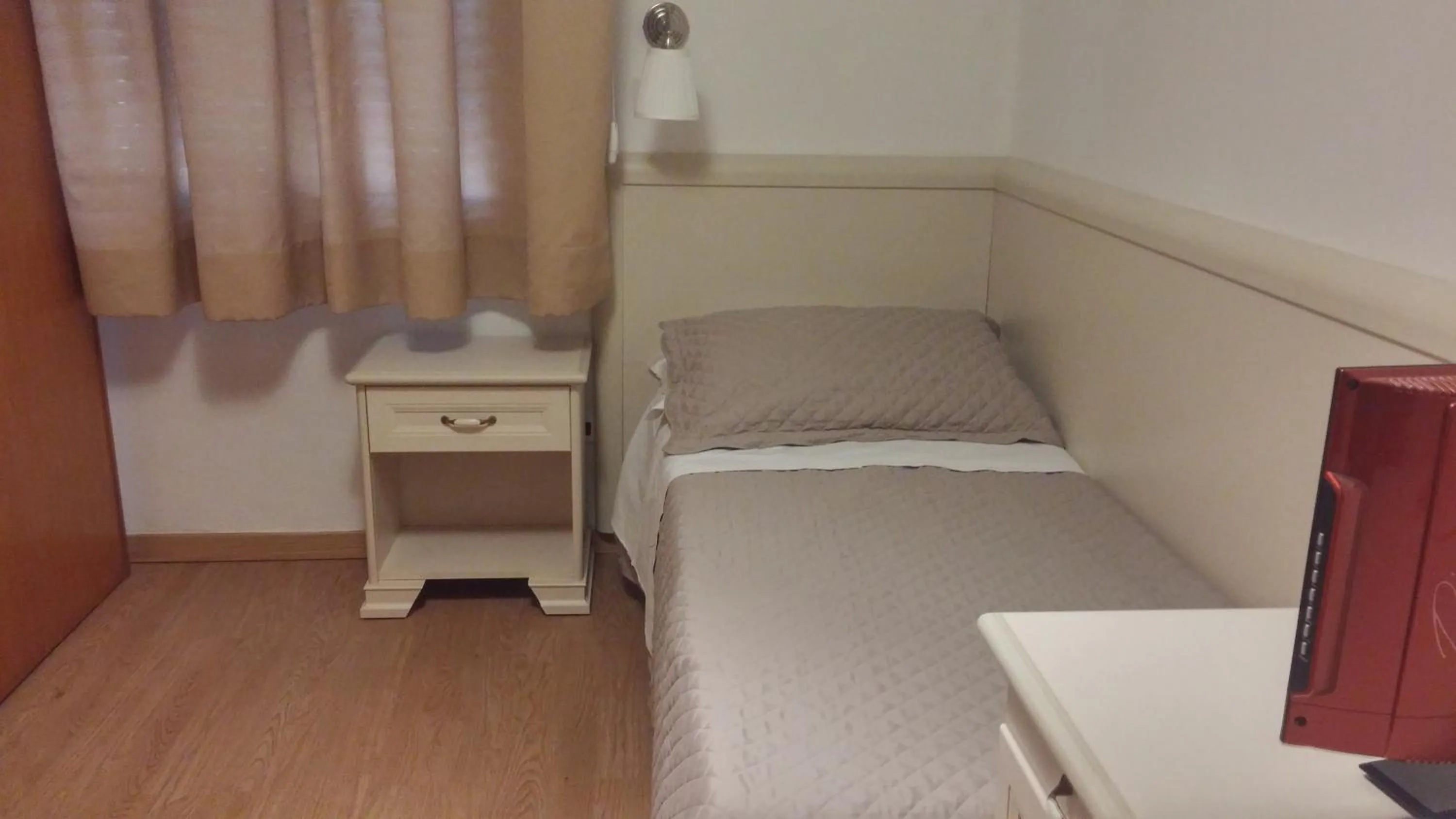 Bed in Hotel Ariston