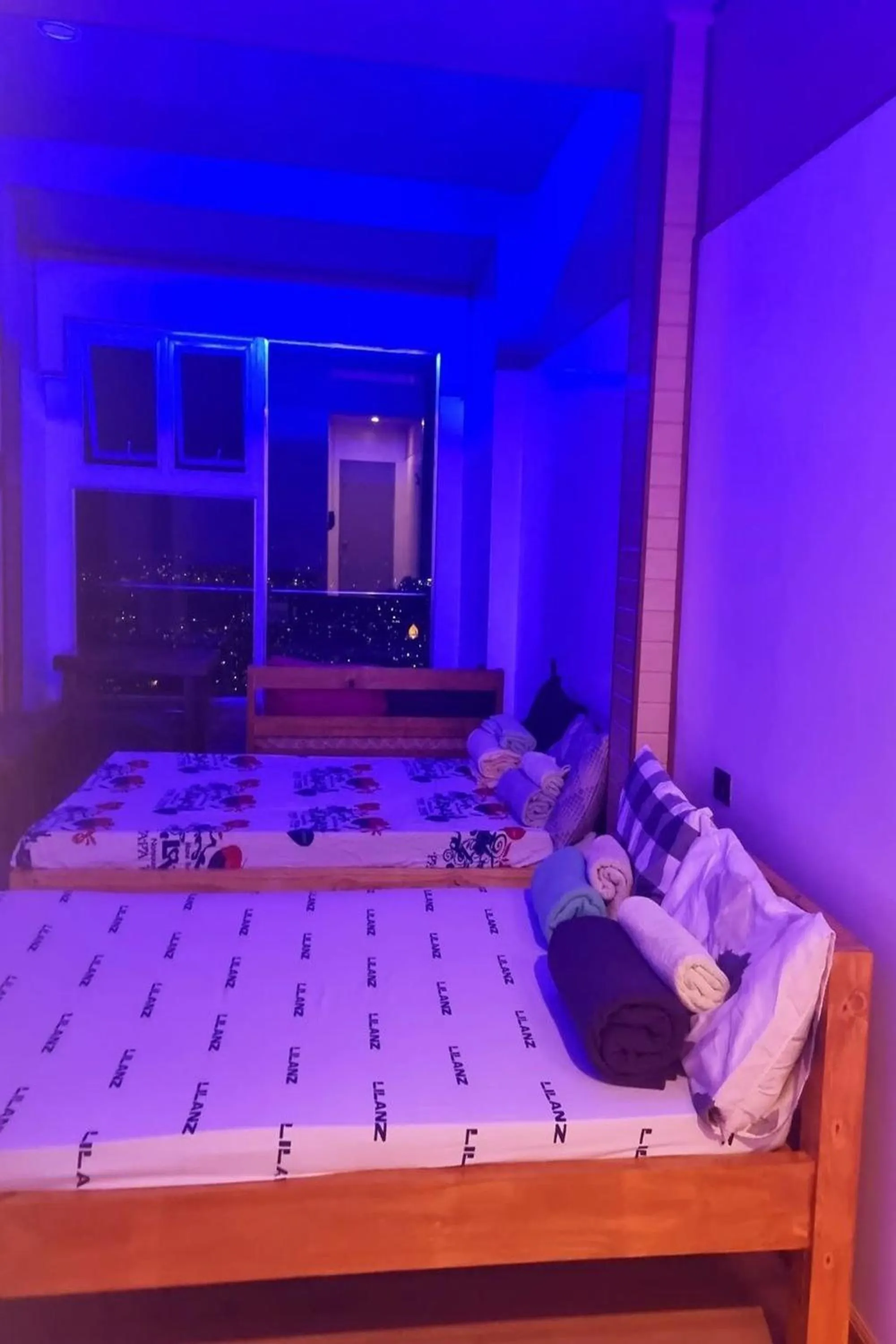 Bed in Wanay's Rocky Mountain Homestay