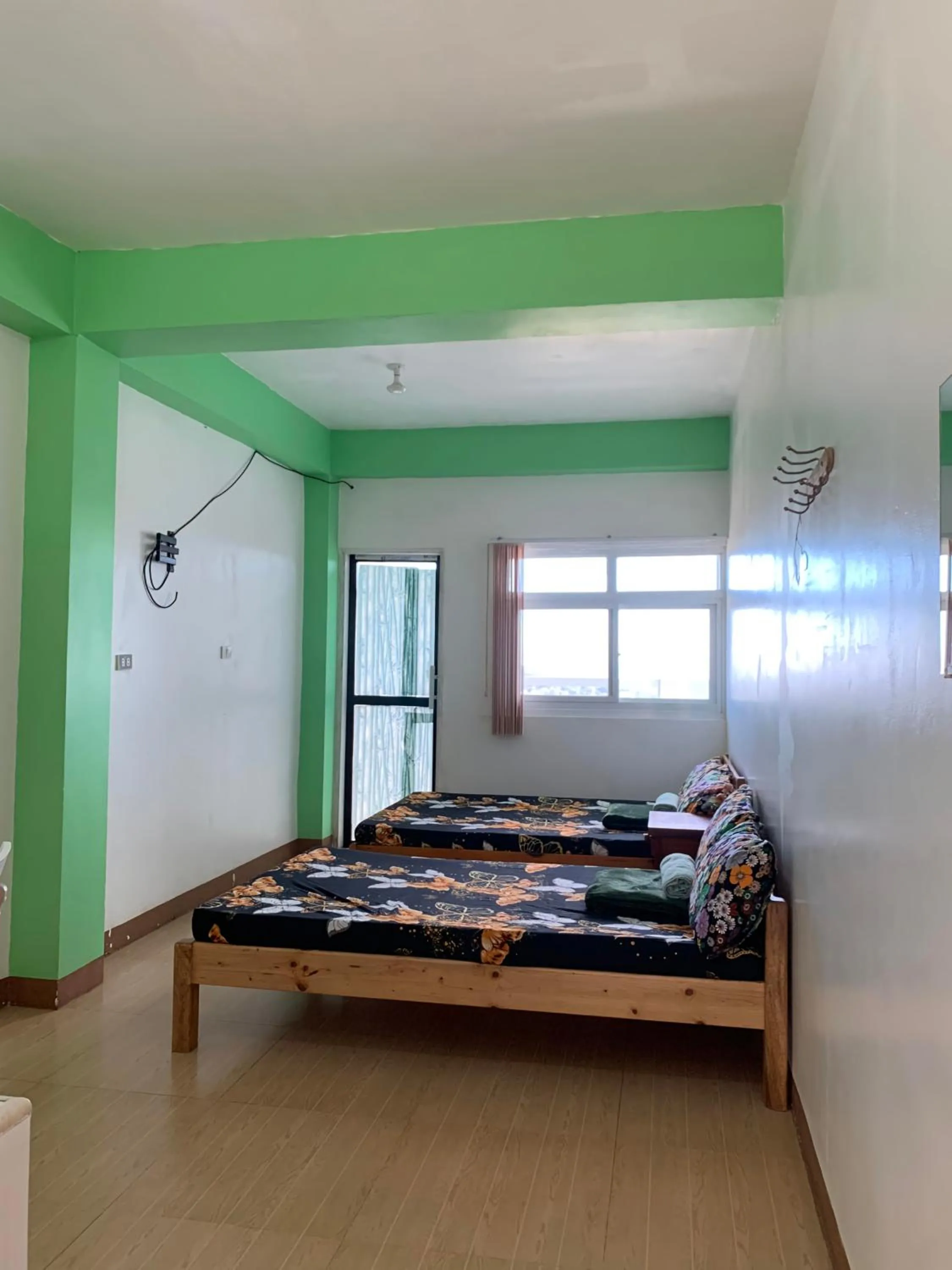 Bed in Wanay's Rocky Mountain Homestay