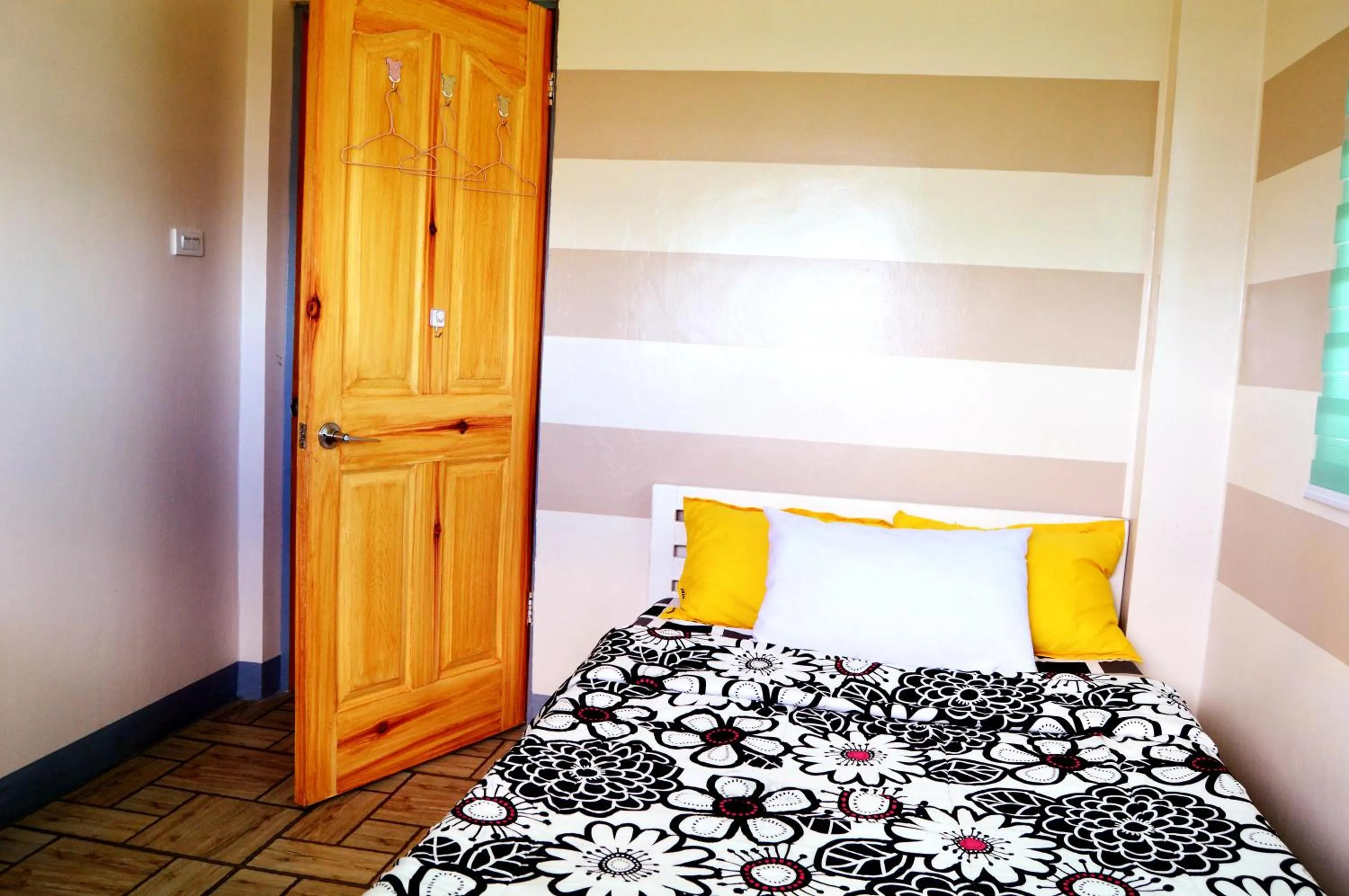 Bed in Wanay's Rocky Mountain Homestay