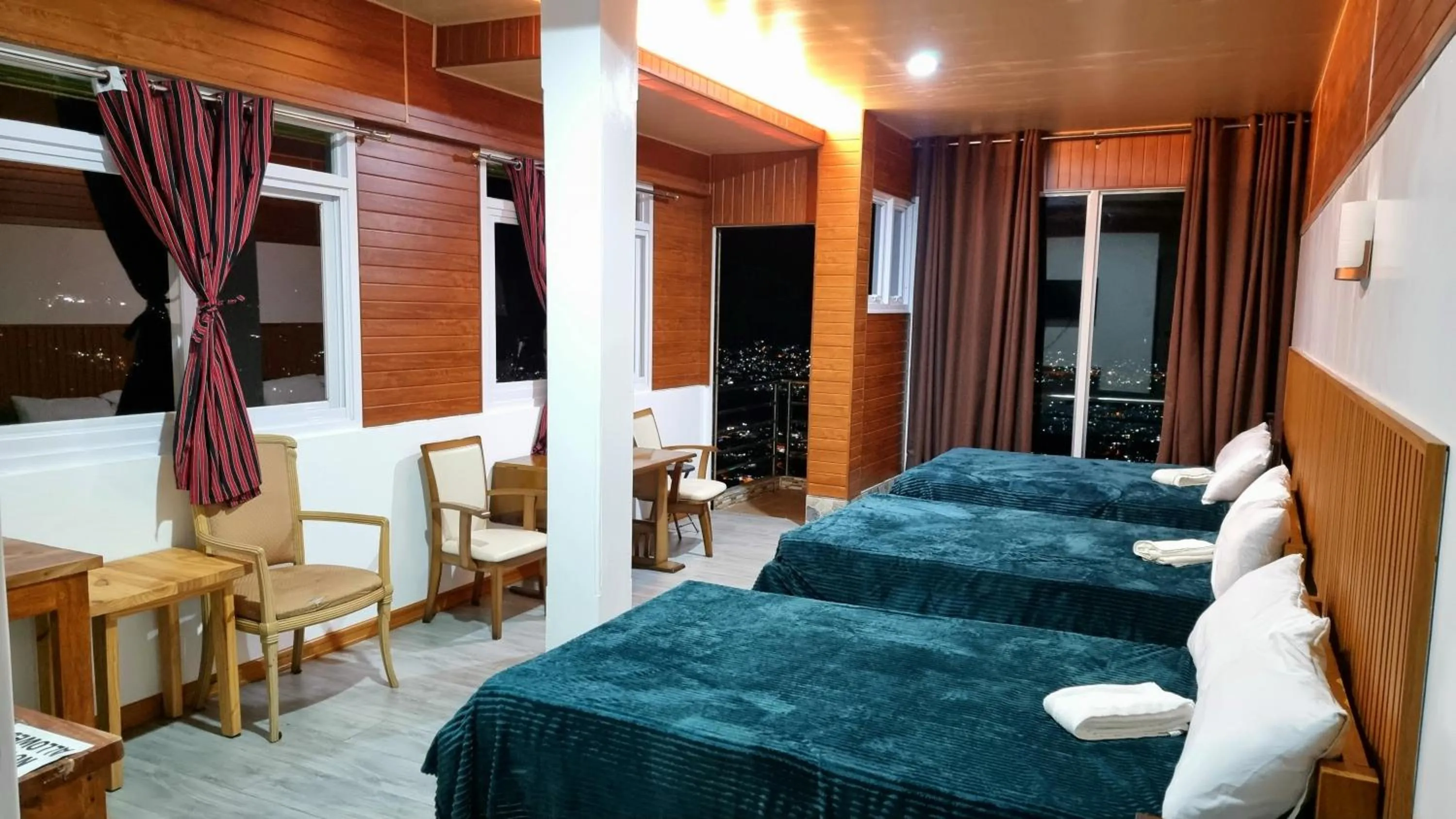 Bed in Wanay's Rocky Mountain Homestay