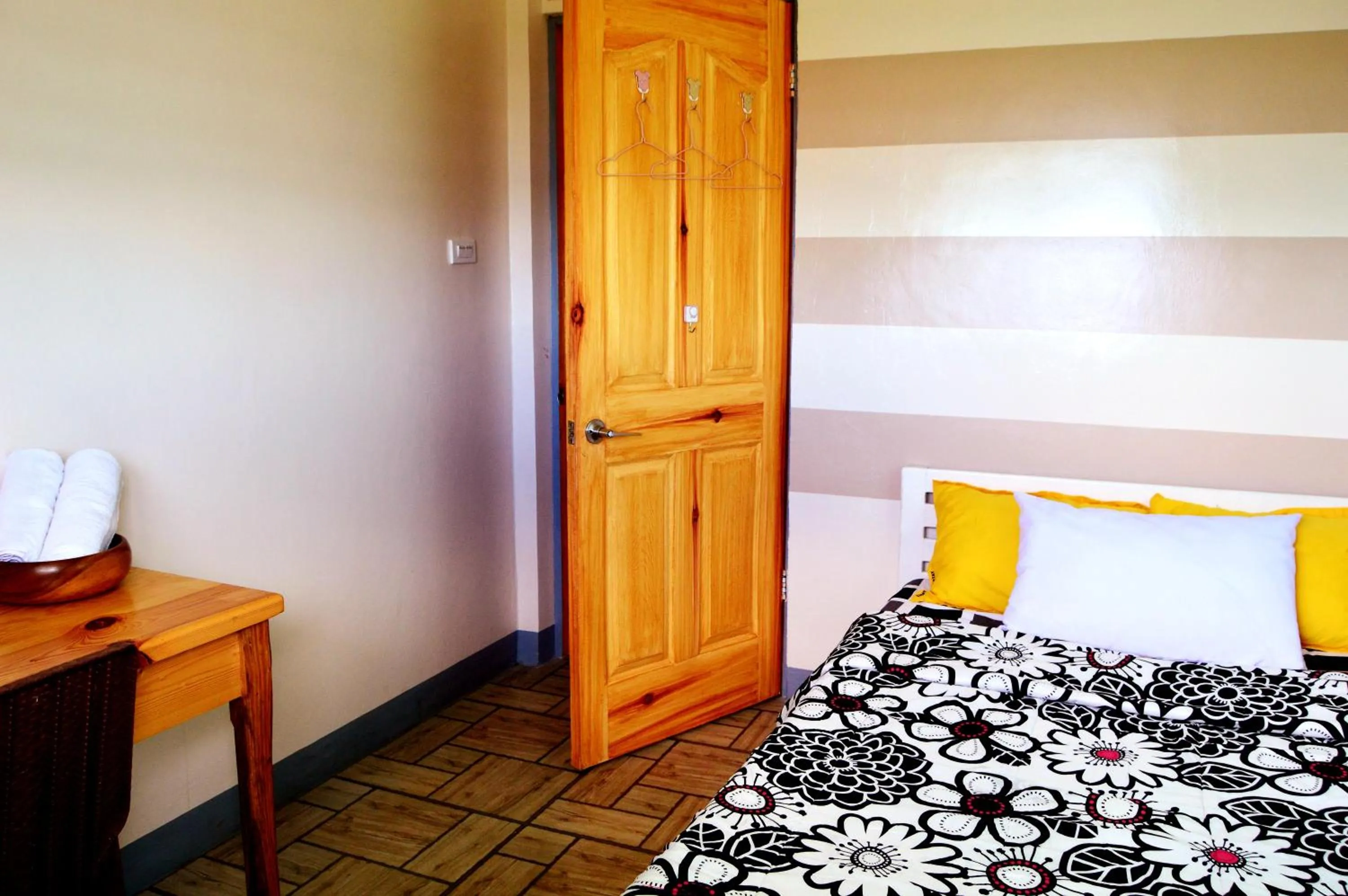 Bed in Wanay's Rocky Mountain Homestay