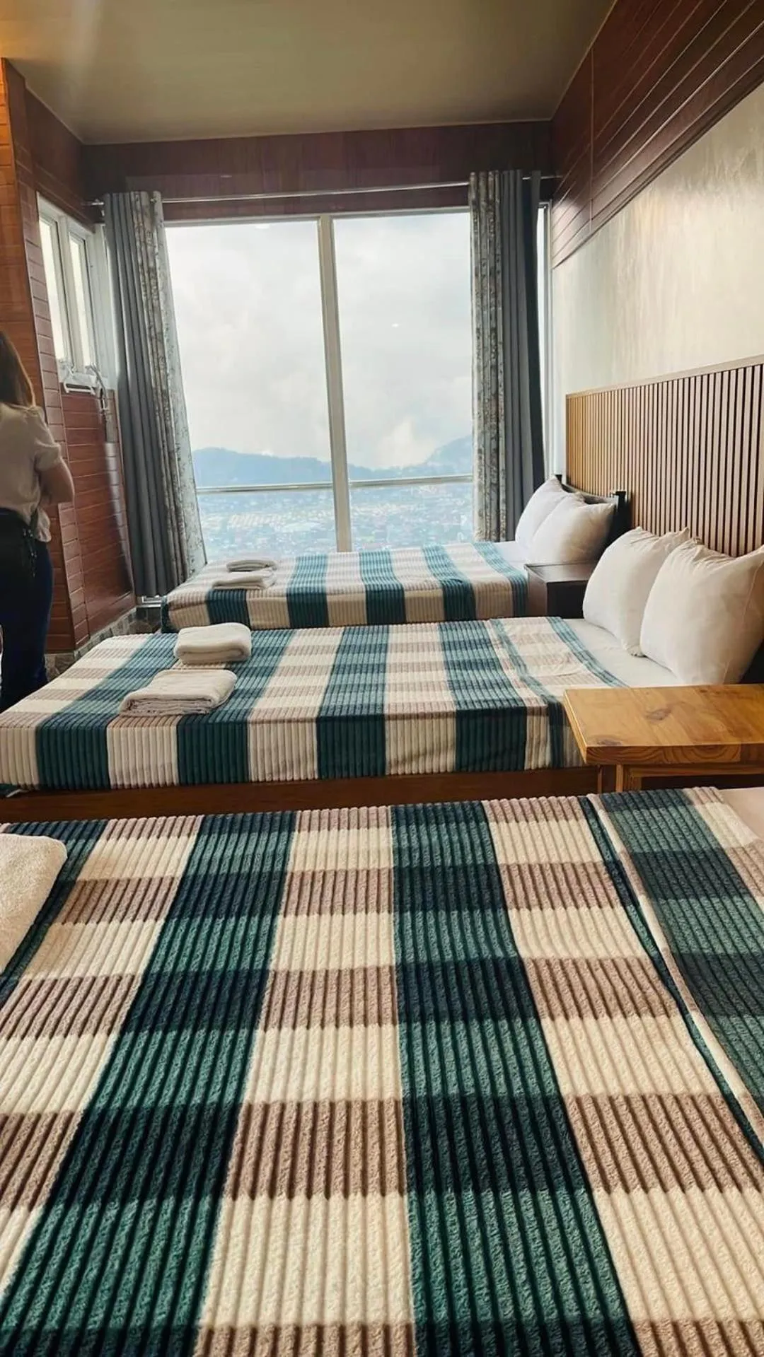 Bed in Wanay's Rocky Mountain Homestay