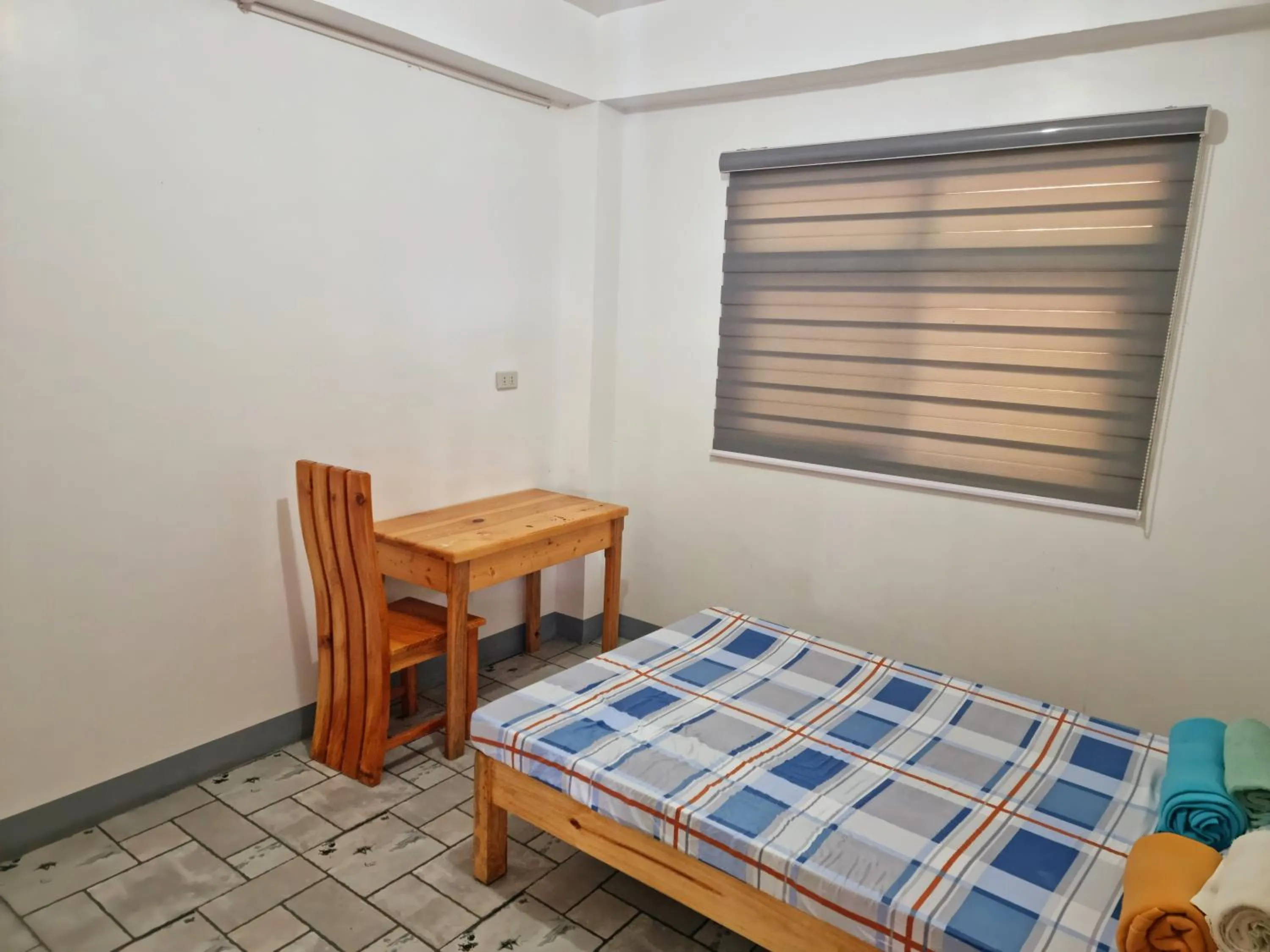 Bed in Wanay's Rocky Mountain Homestay