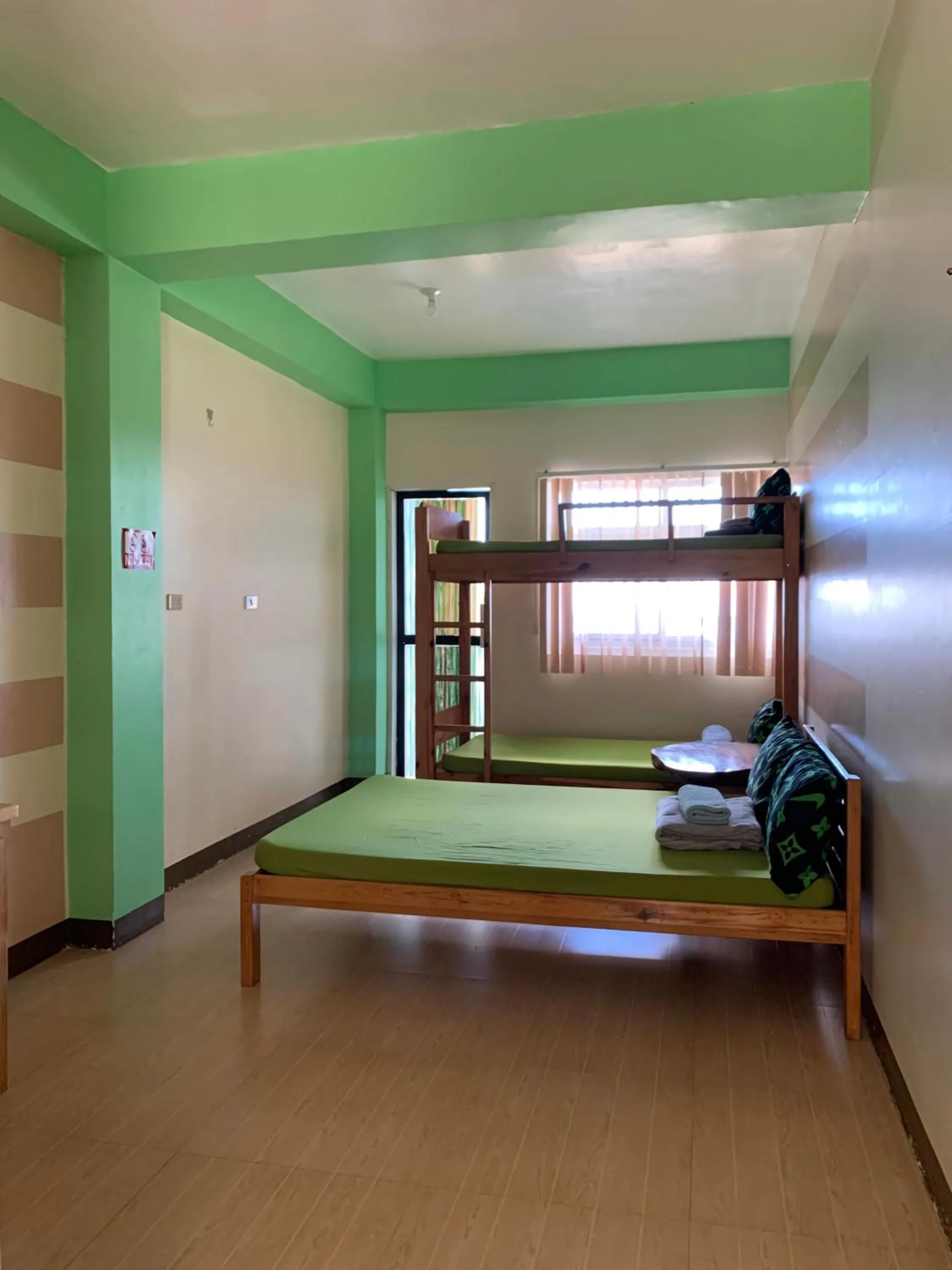 Bed in Wanay's Rocky Mountain Homestay