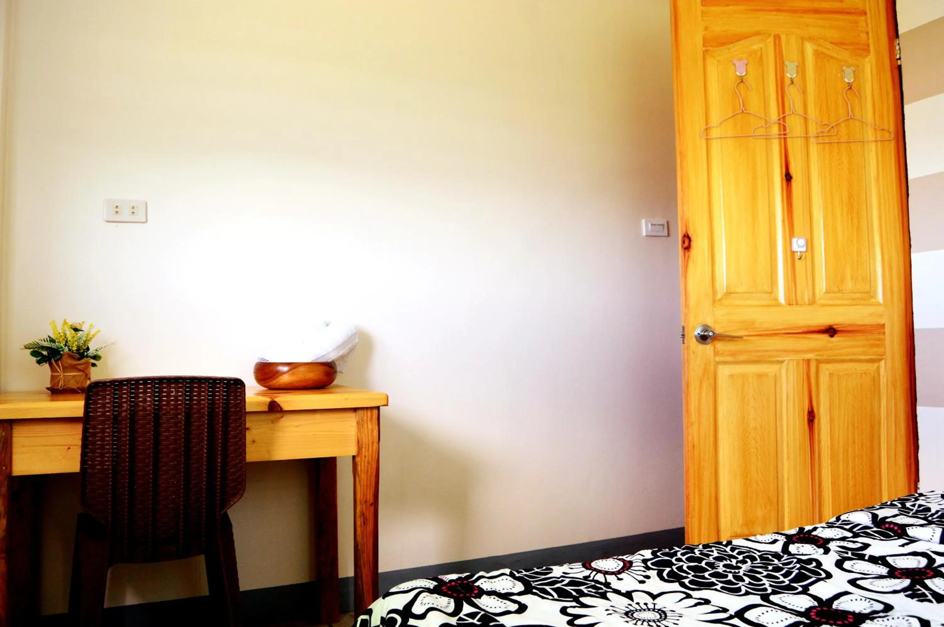 Bed in Wanay's Rocky Mountain Homestay