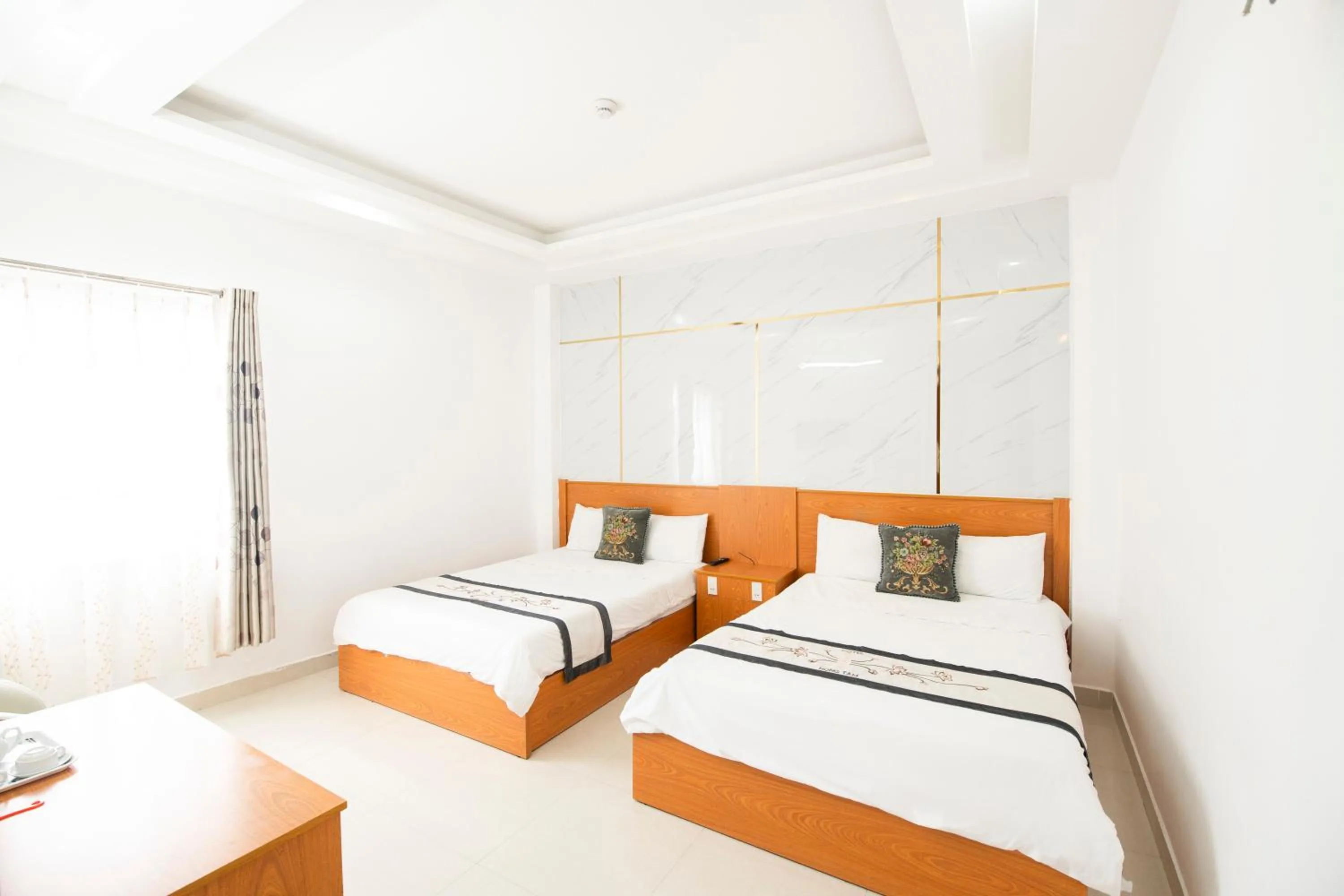 Bed in Hồng Tâm Hotel