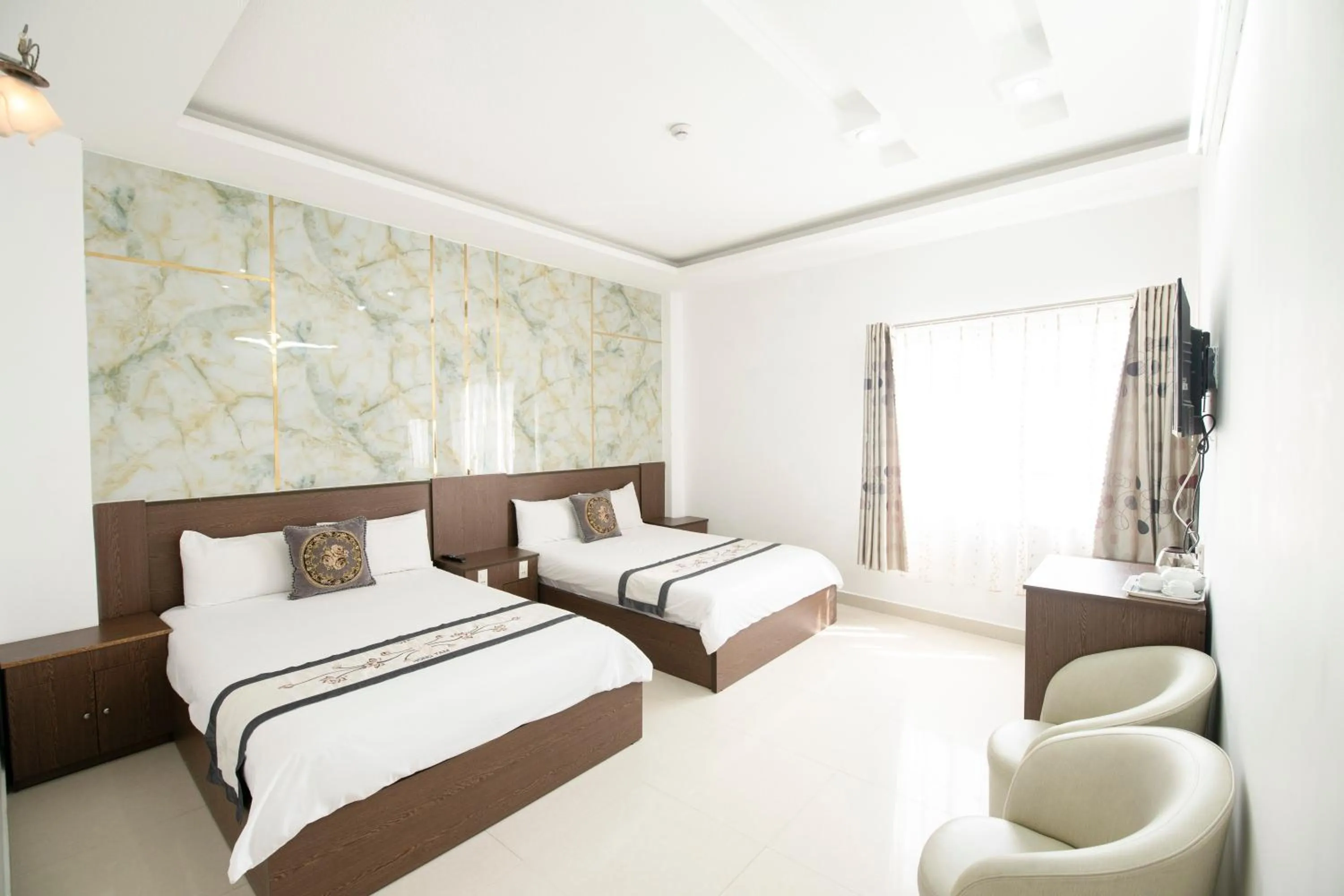 Bed in Hồng Tâm Hotel