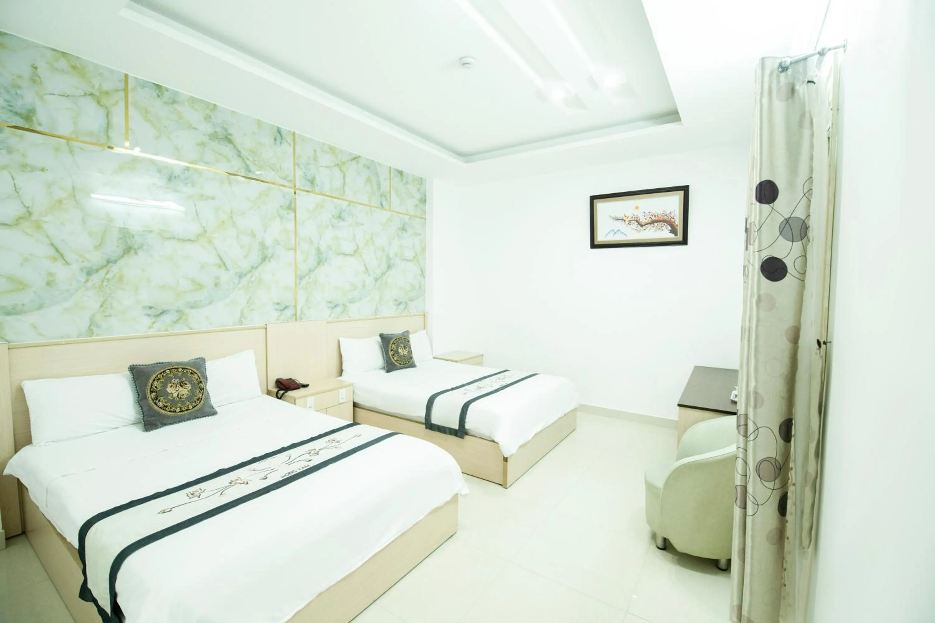 Bed in Hồng Tâm Hotel