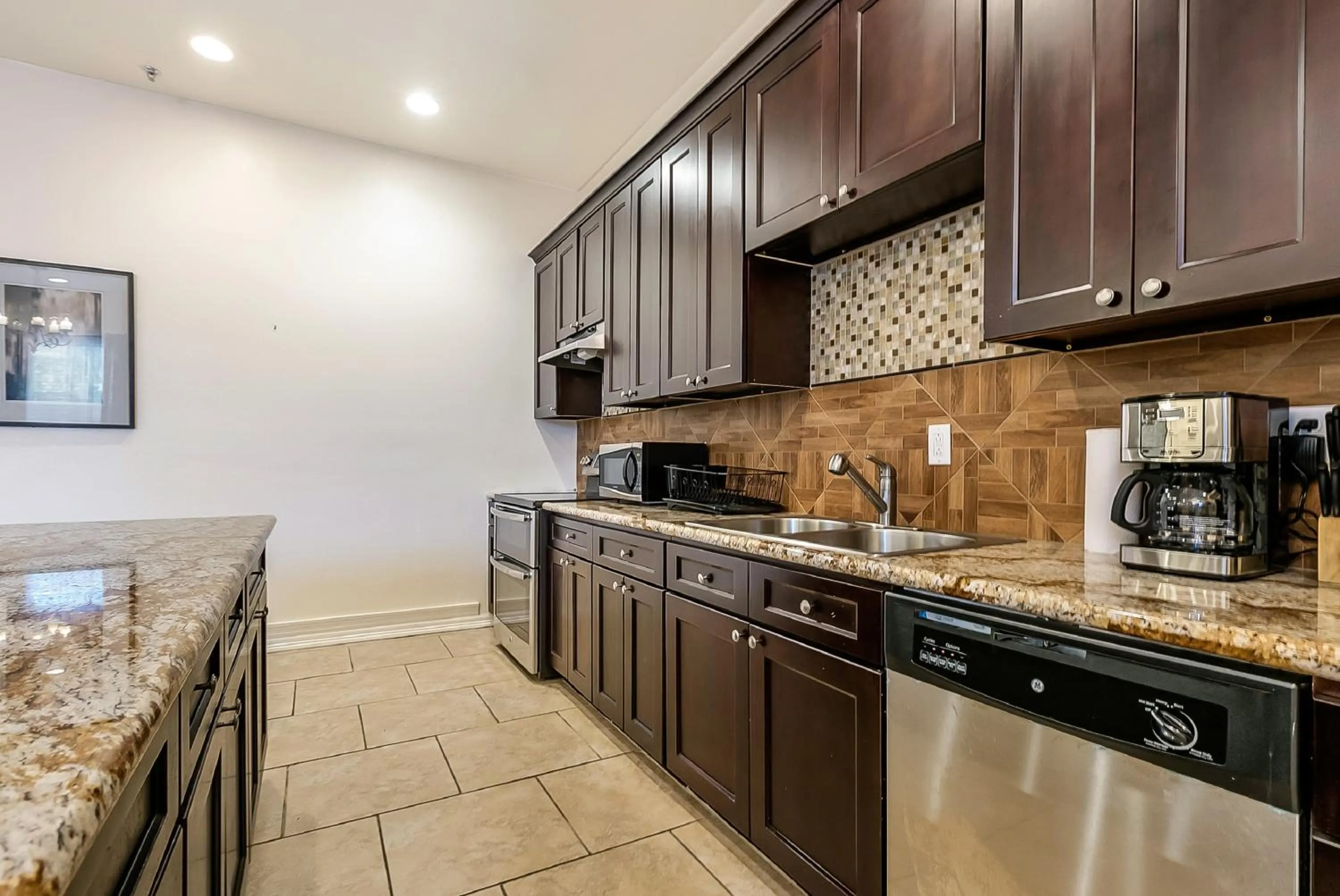 Kitchen or kitchenette in Inviting 3BR Condo steps from St Charles Ave