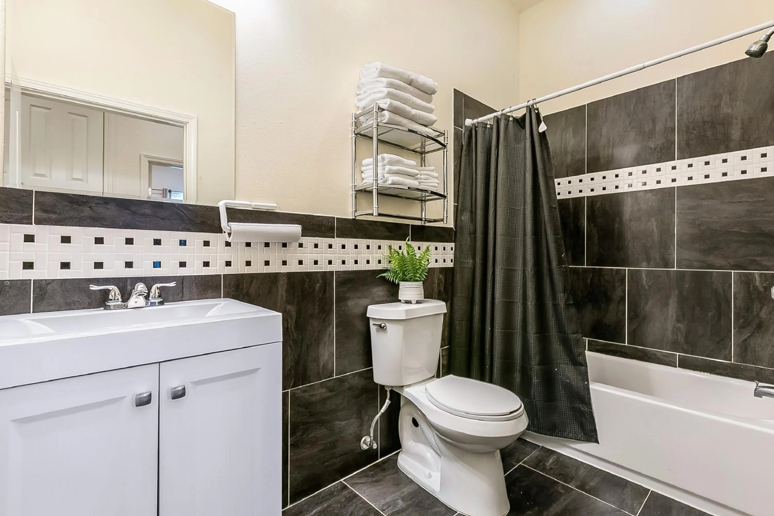 Bathroom in Inviting 3BR Condo steps from St Charles Ave