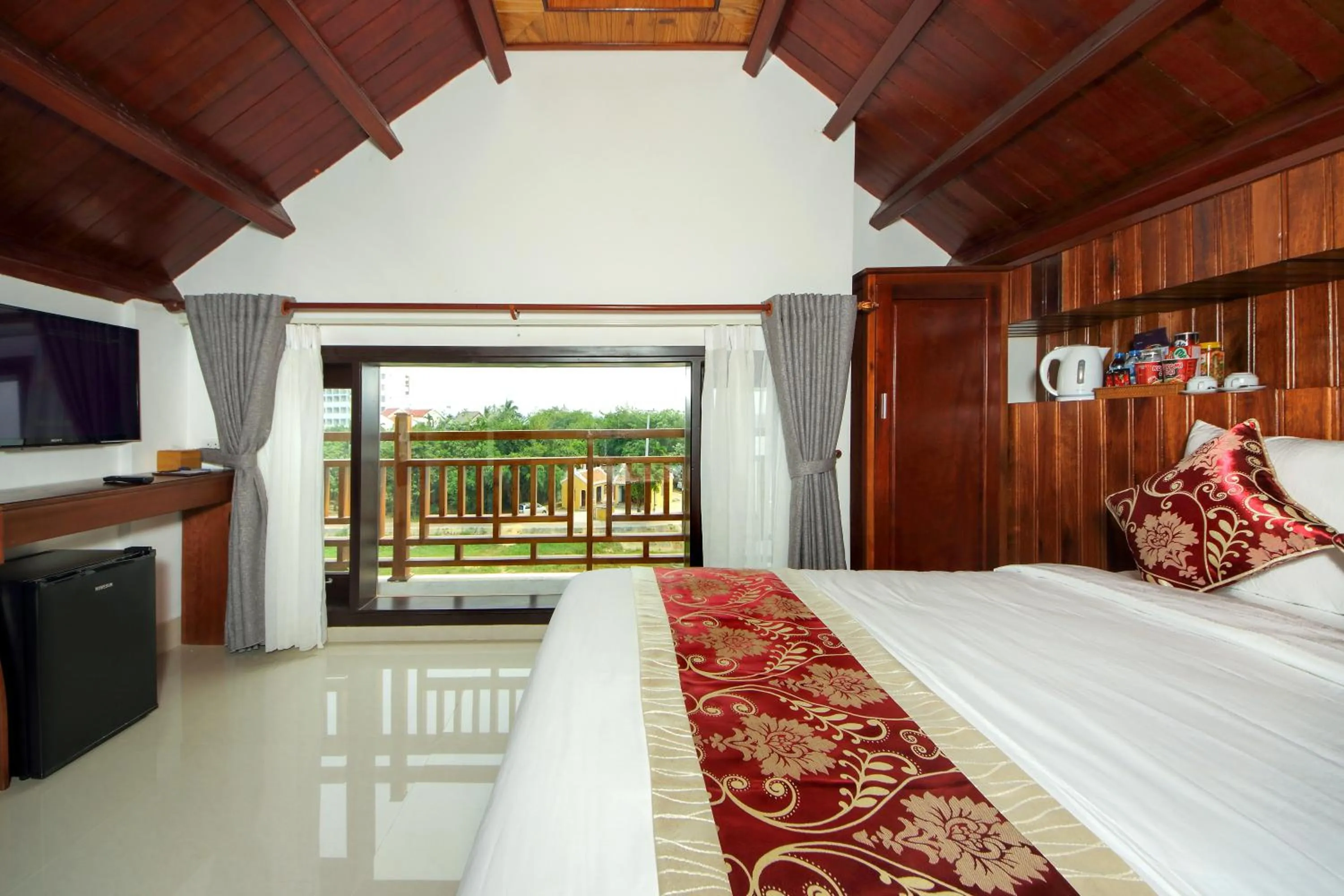 Bed in Threeway Riverside Villa