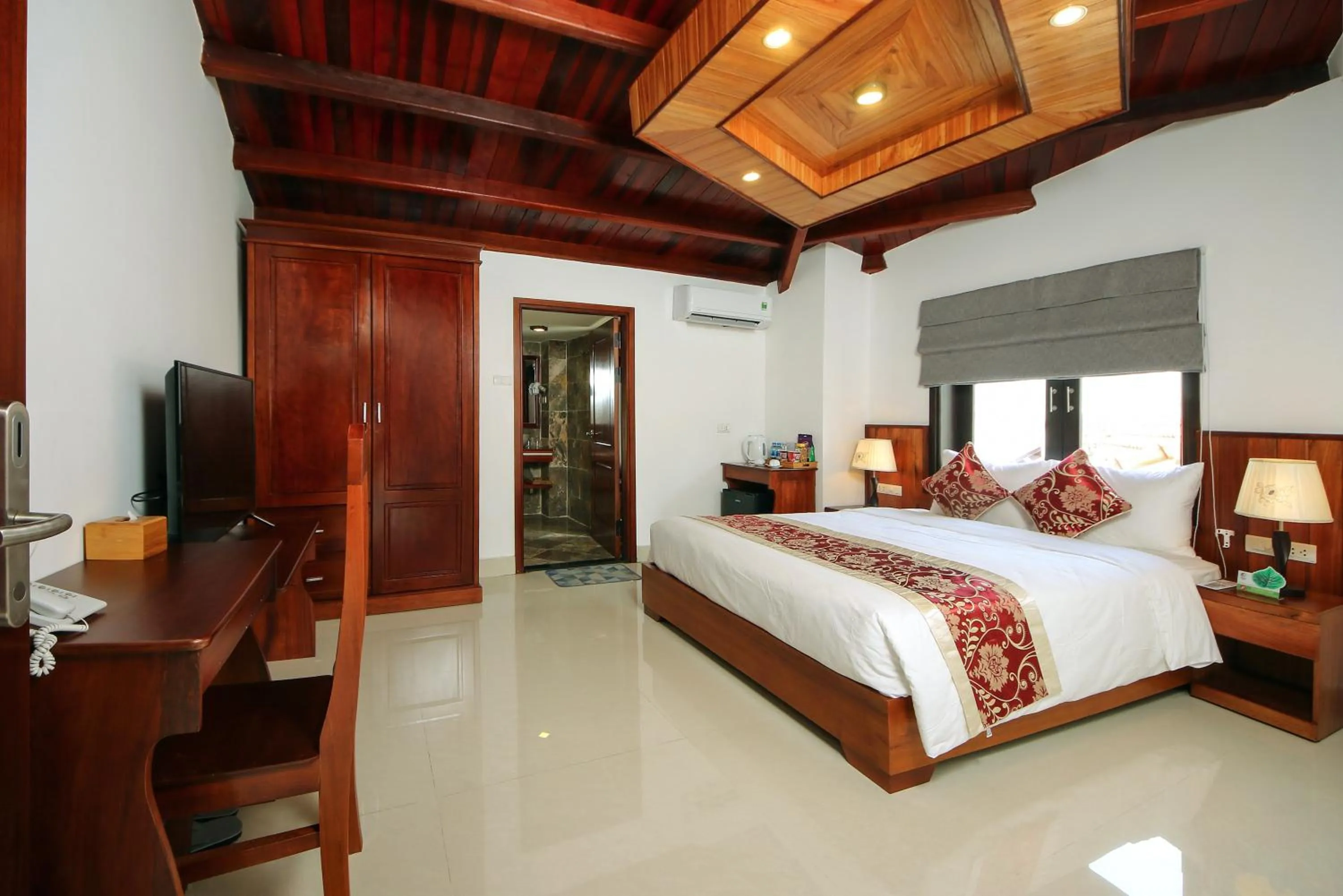 Bed in Threeway Riverside Villa