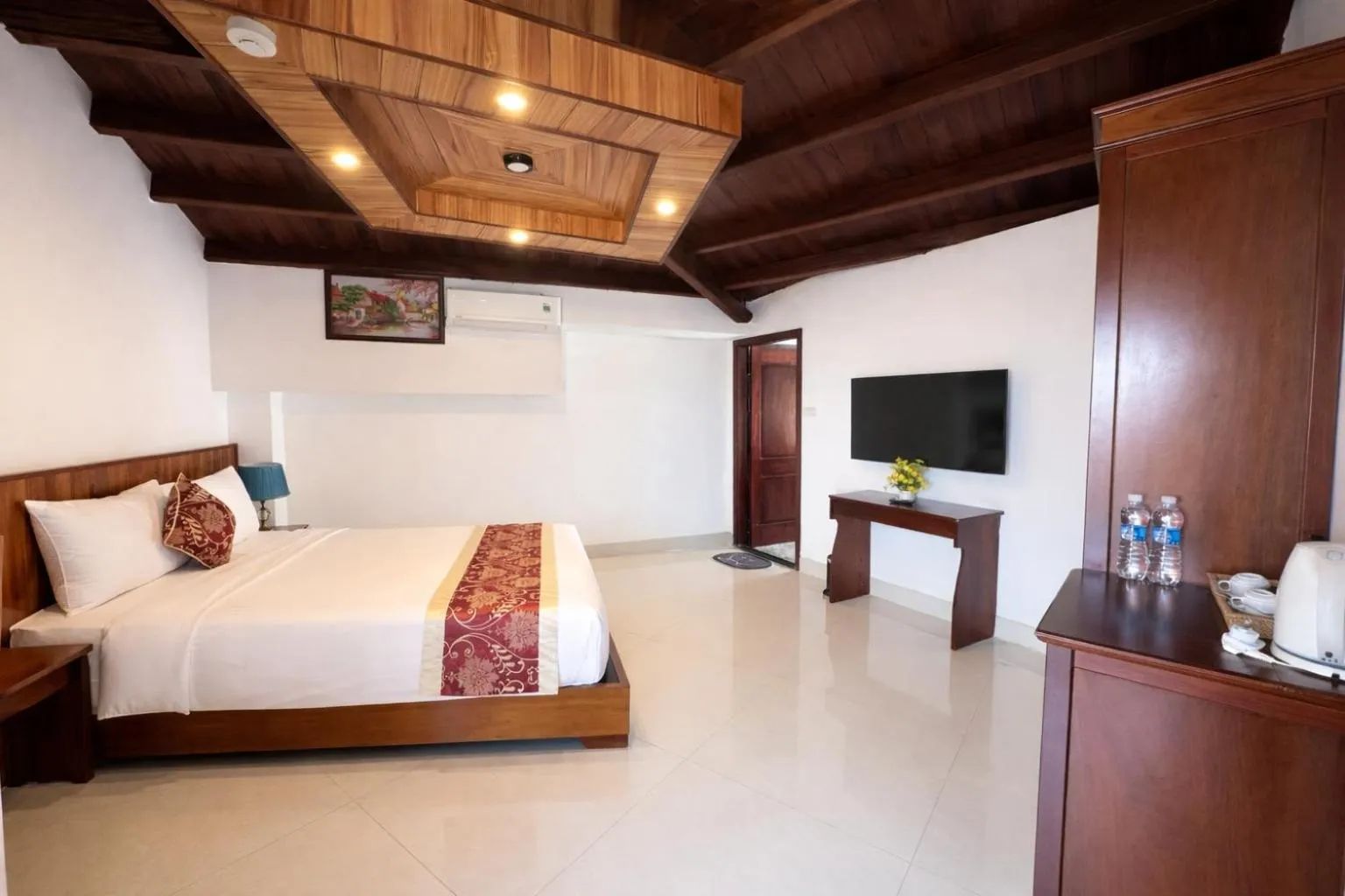 Bed in Threeway Riverside Villa